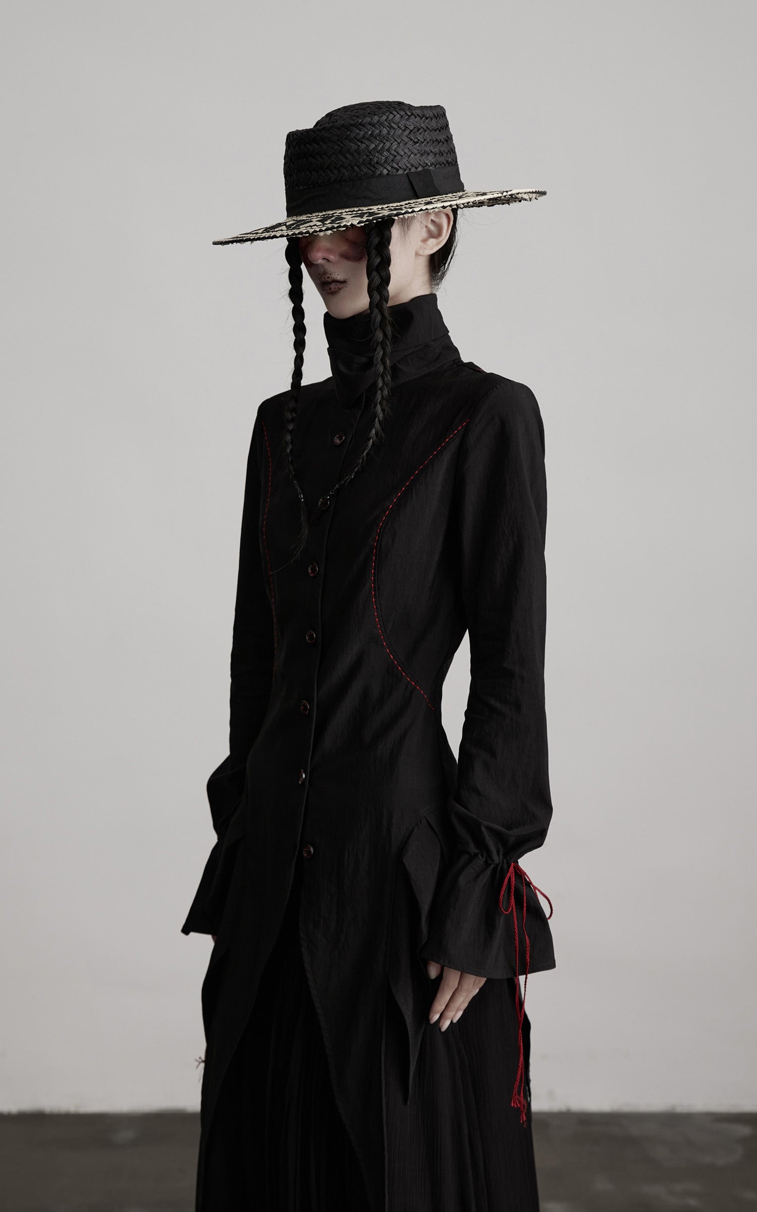 INDULGE Asymmetric Hem Shirt with Red Stitch Detail