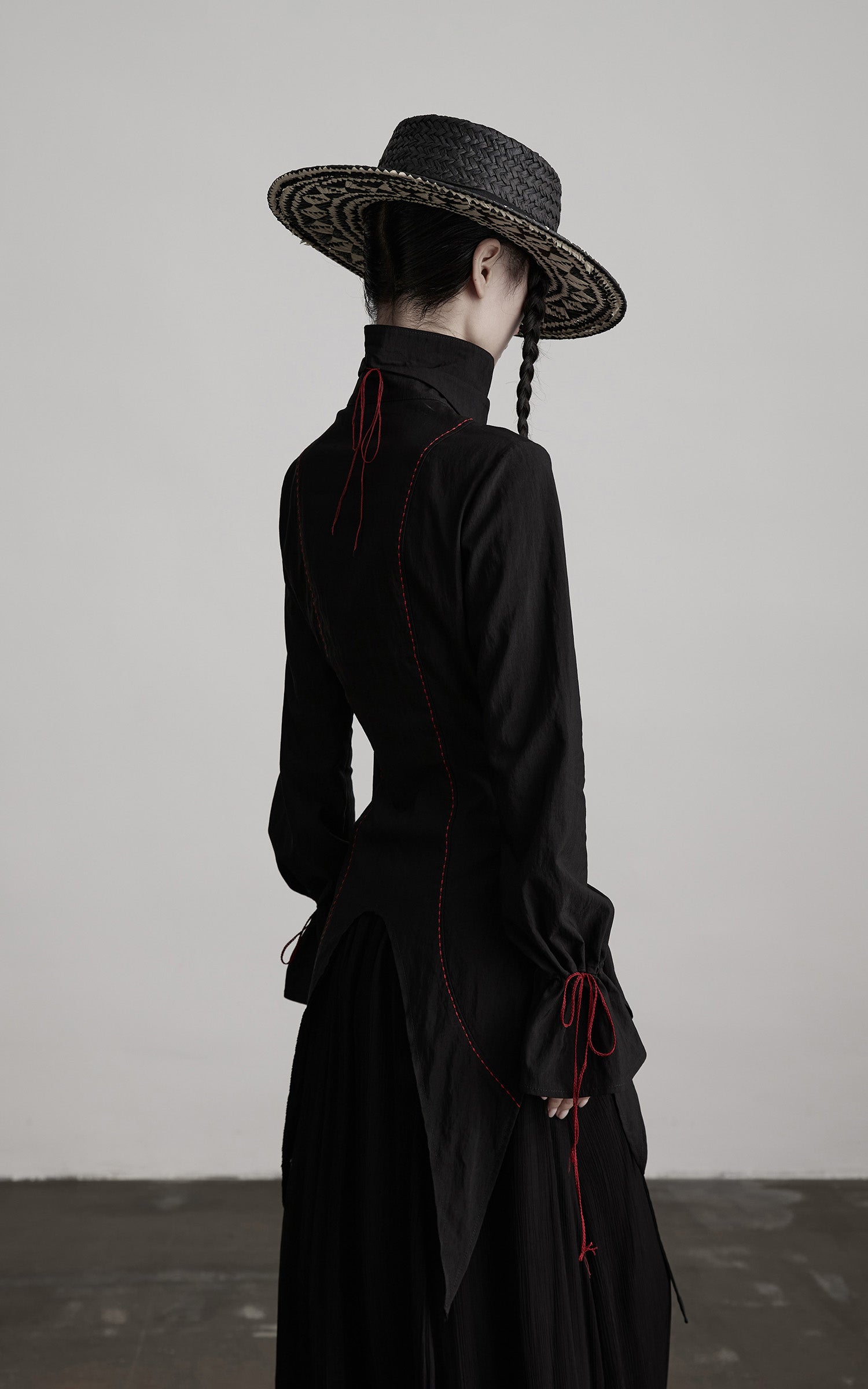 INDULGE Asymmetric Hem Shirt with Red Stitch Detail