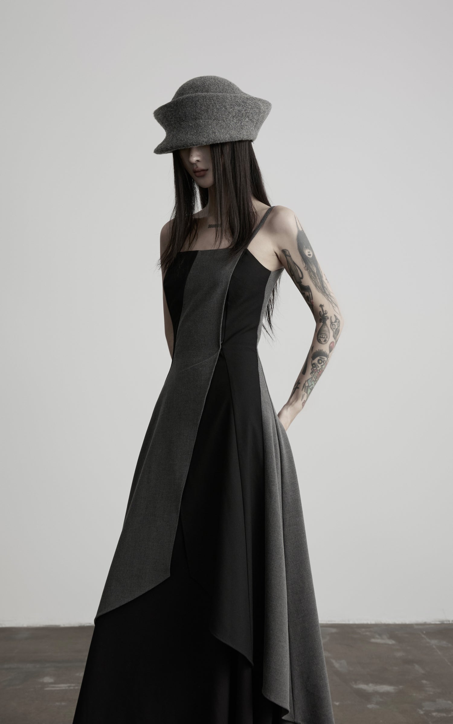 Load video: DOINDULGE Deconstructed Paneled Maxi Dress