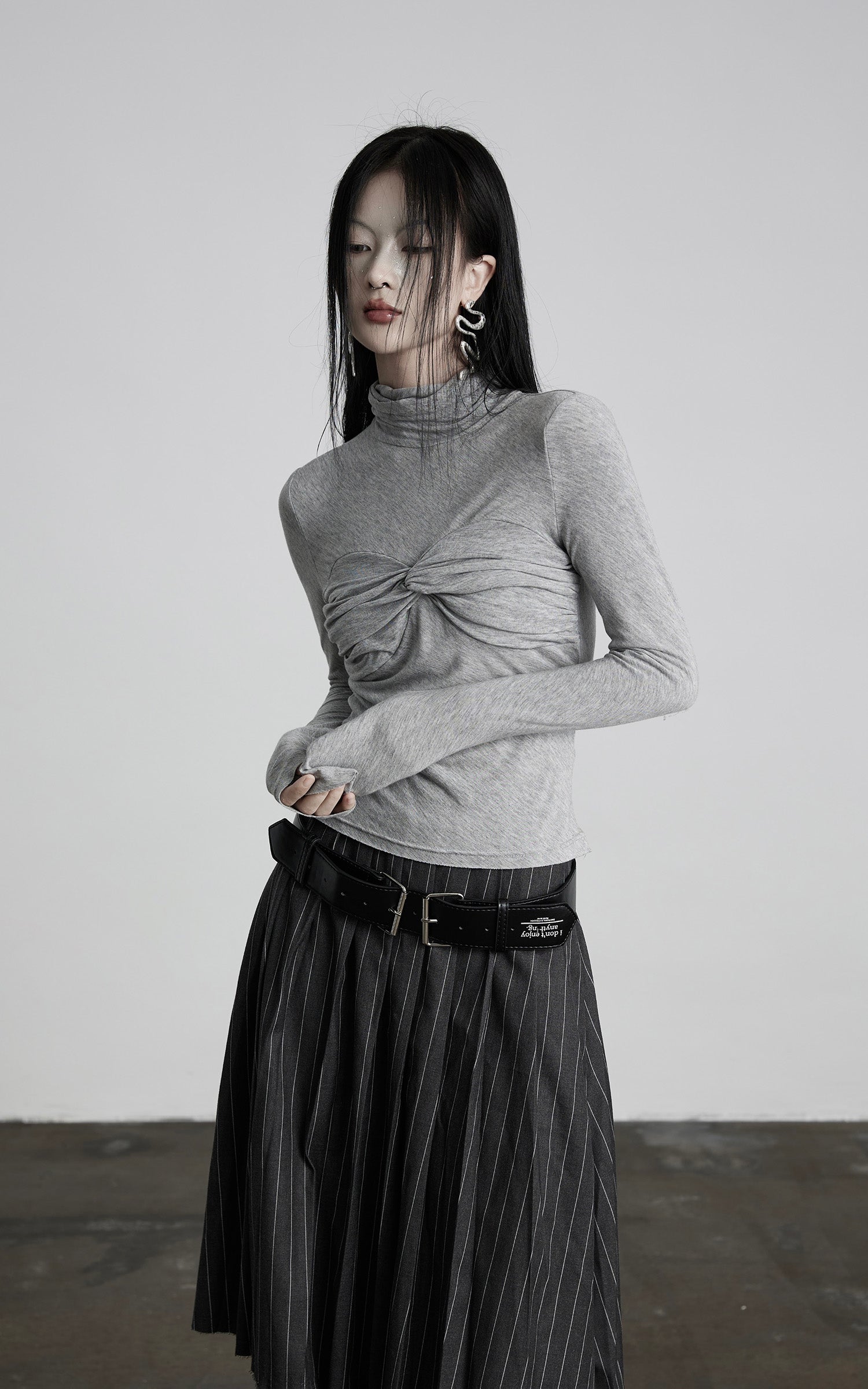 INDULGE Draped Twist Knit Top with High Neck and Long Sleeves