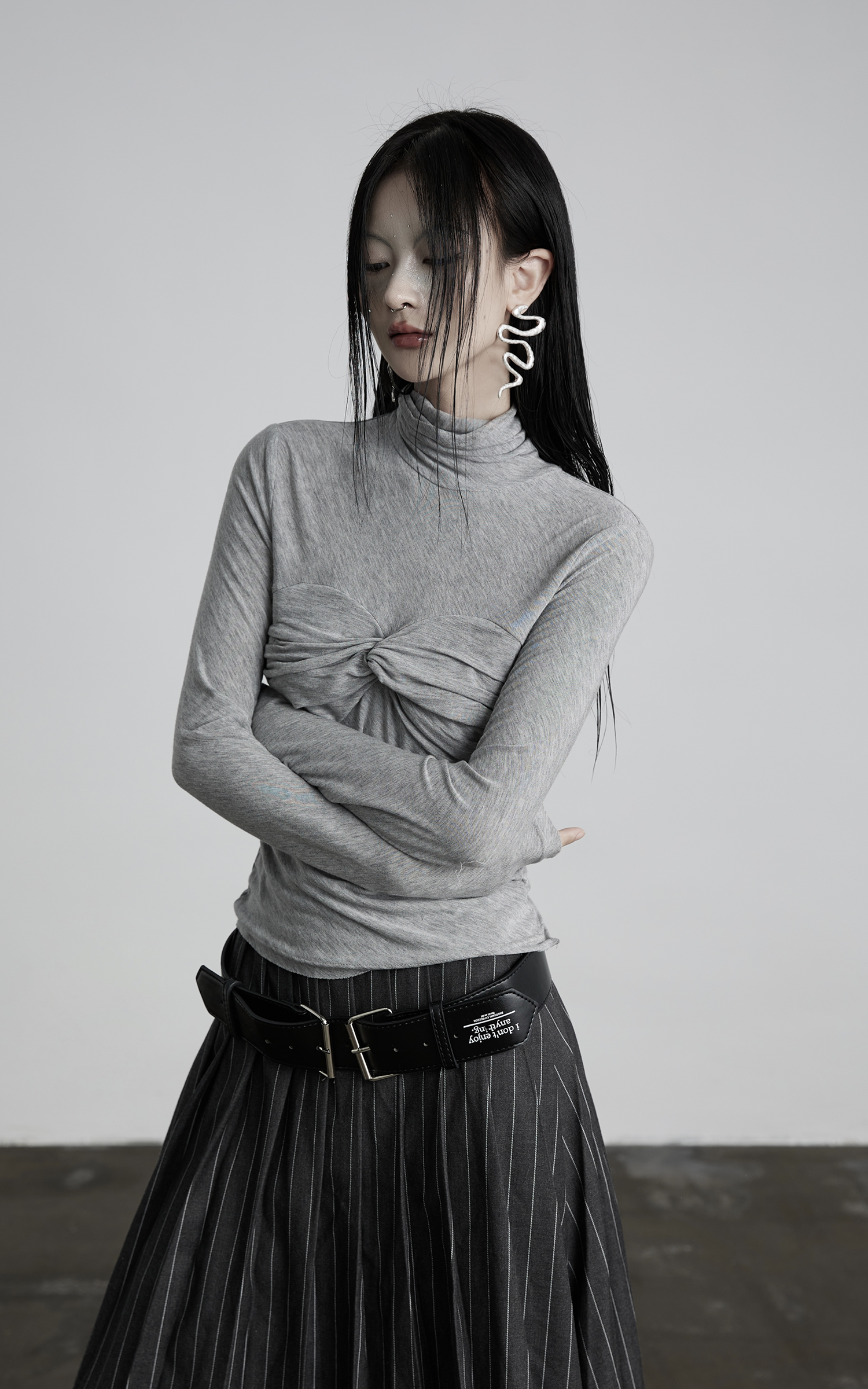 INDULGE Draped Twist Knit Top with High Neck and Long Sleeves