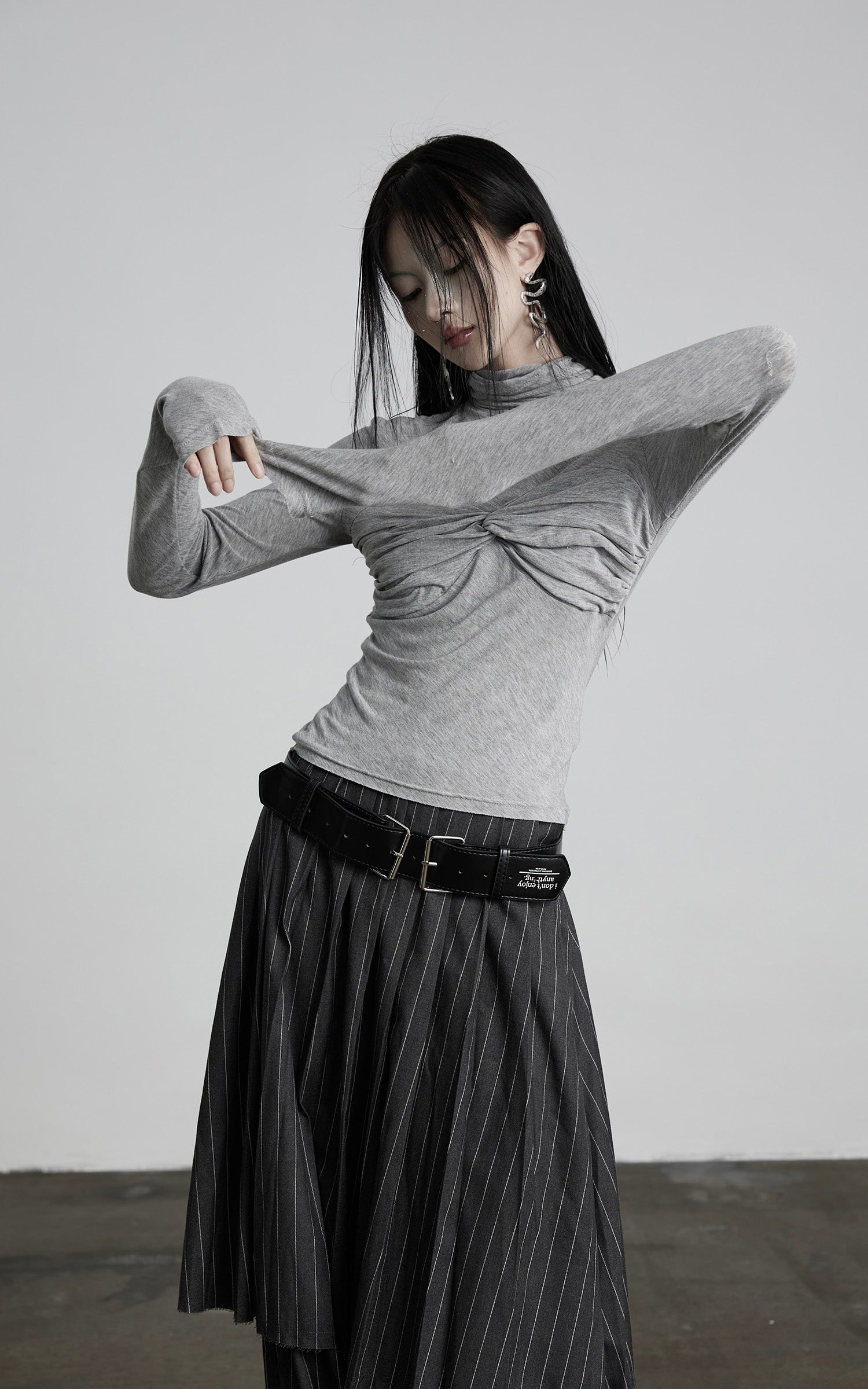 INDULGE Draped Twist Knit Top with High Neck and Long Sleeves