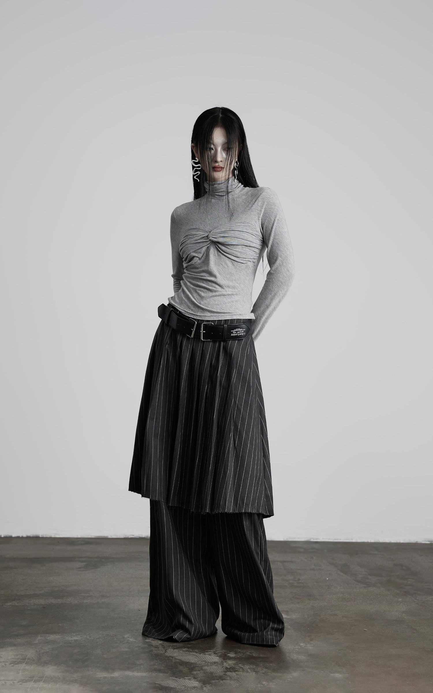 INDULGE Draped Twist Knit Top with High Neck and Long Sleeves