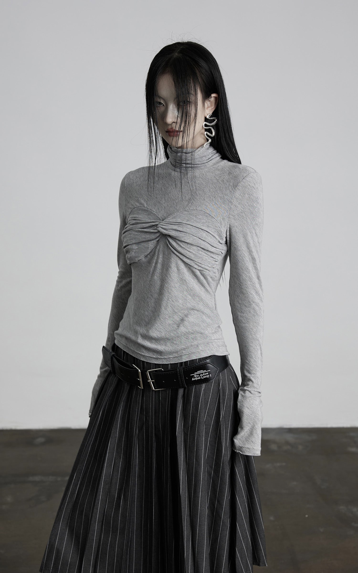 INDULGE Draped Twist Knit Top with High Neck and Long Sleeves