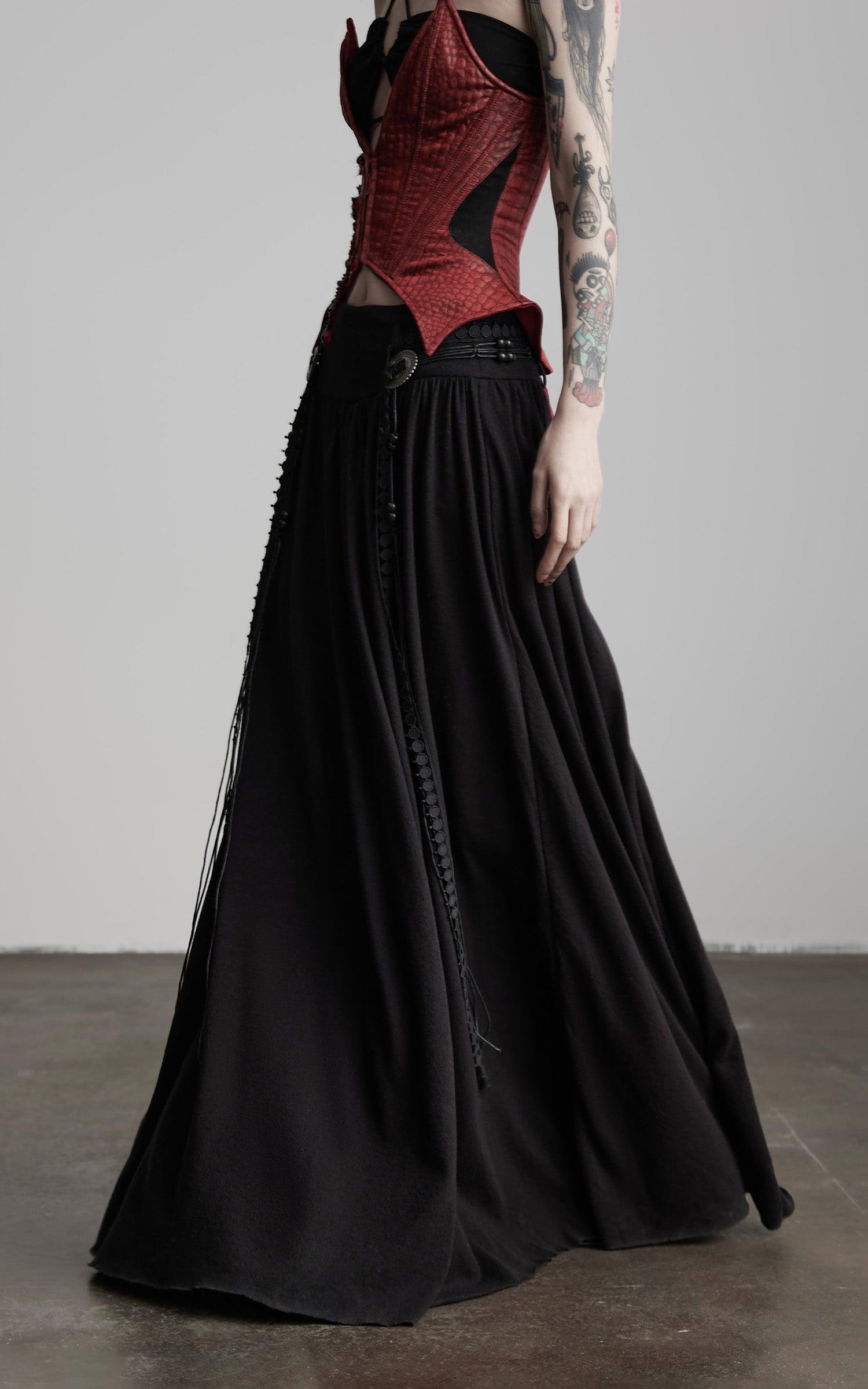 INDULGE Draped Maxi Skirt with Embroidered Tassel Straps