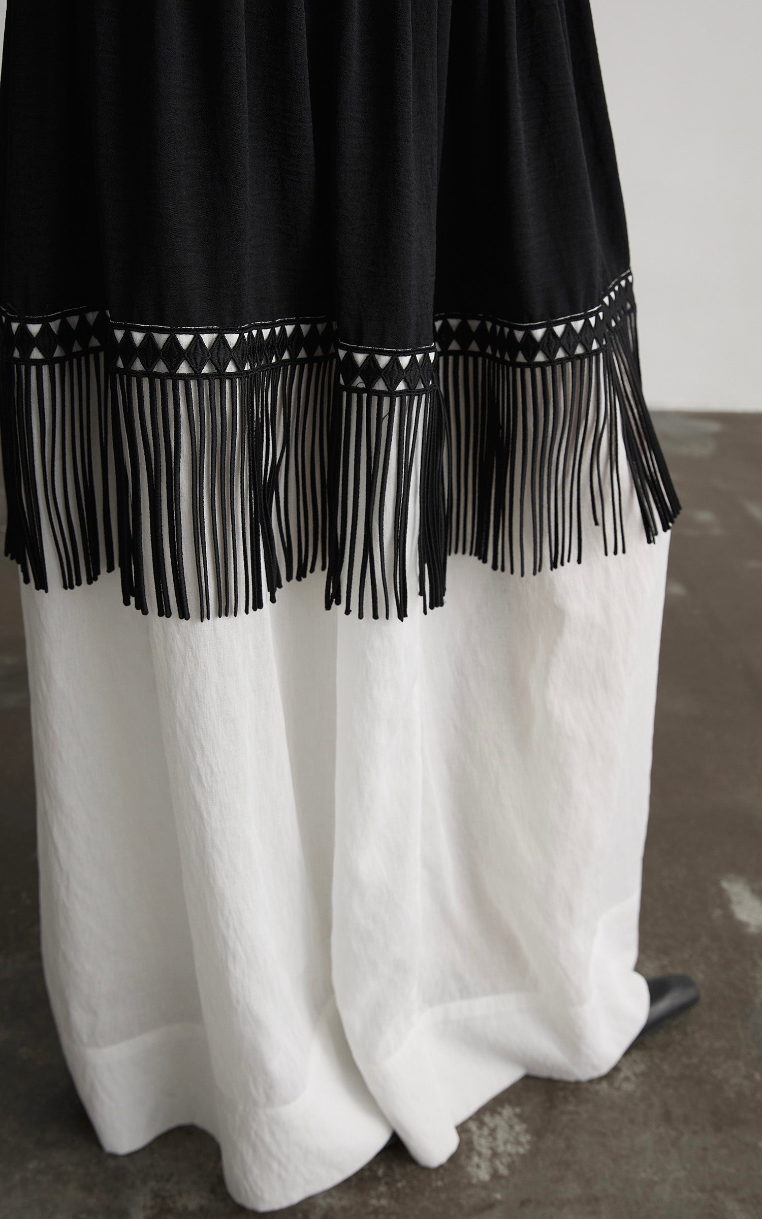 INDULGE Fringe Paneled Layered Skirt with Pleats and Contrast Hem