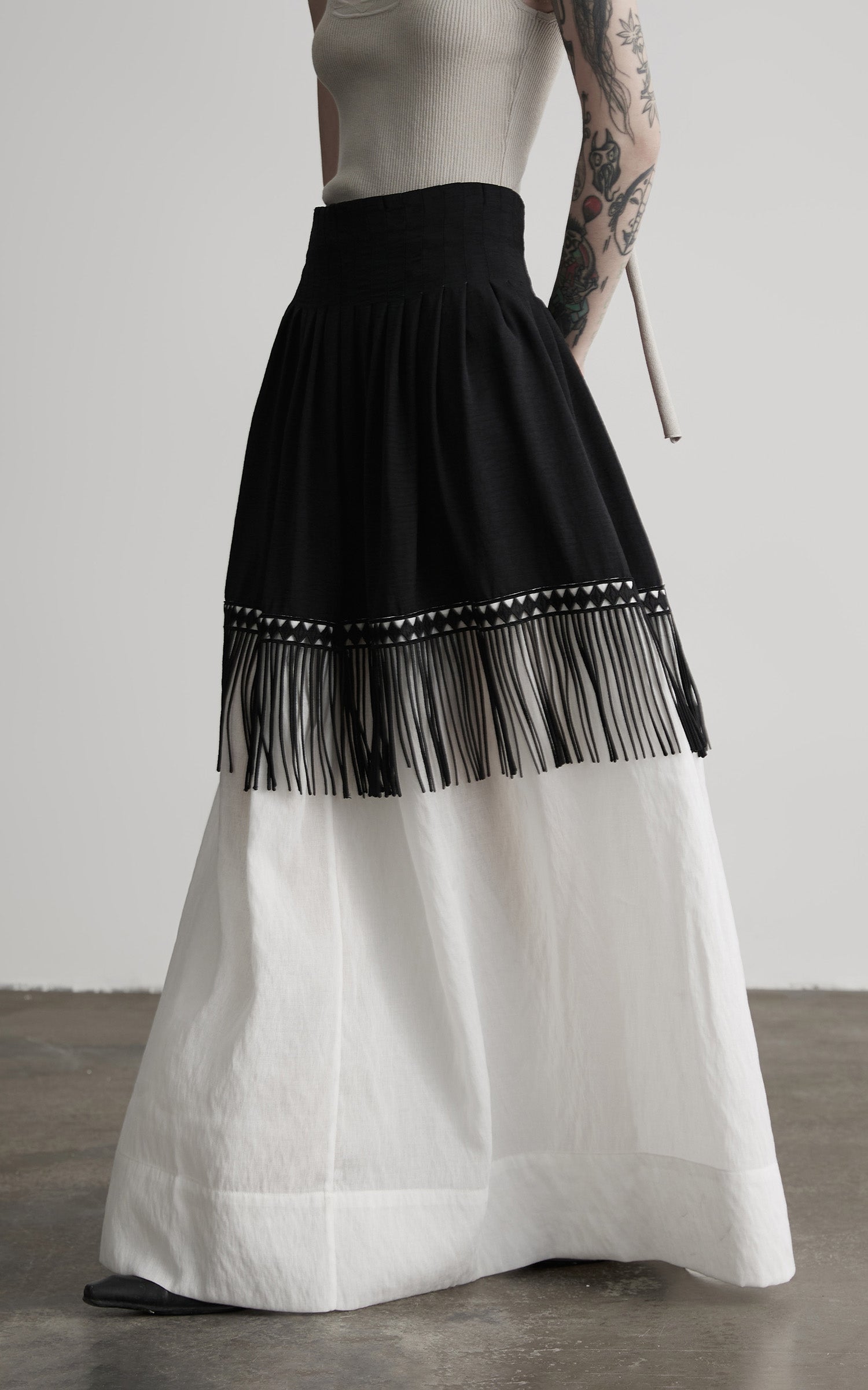 INDULGE Fringe Paneled Layered Skirt with Pleats and Contrast Hem