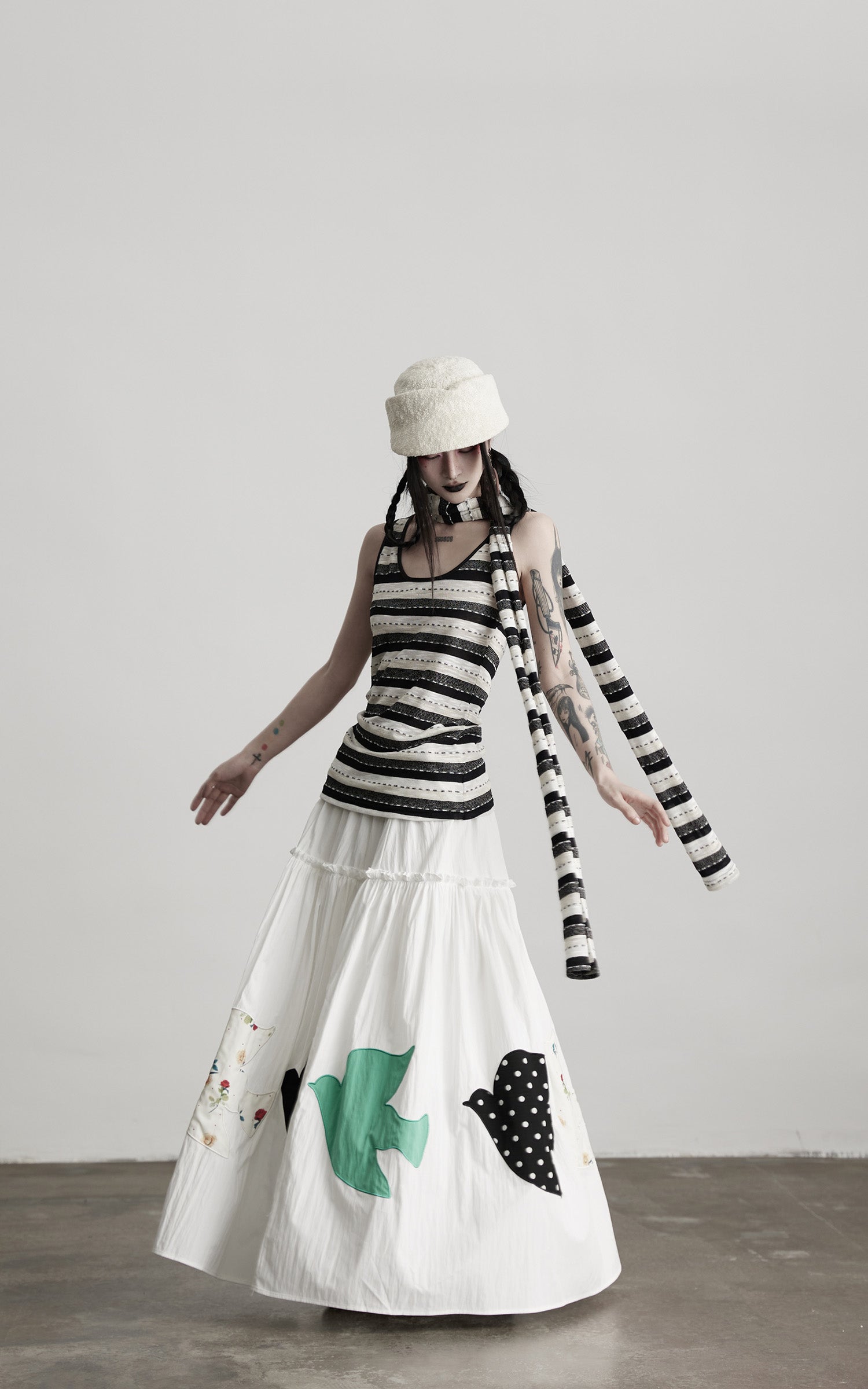 INDULGE Bird Patch Panel Maxi Skirt with Raw Volume Silhouette