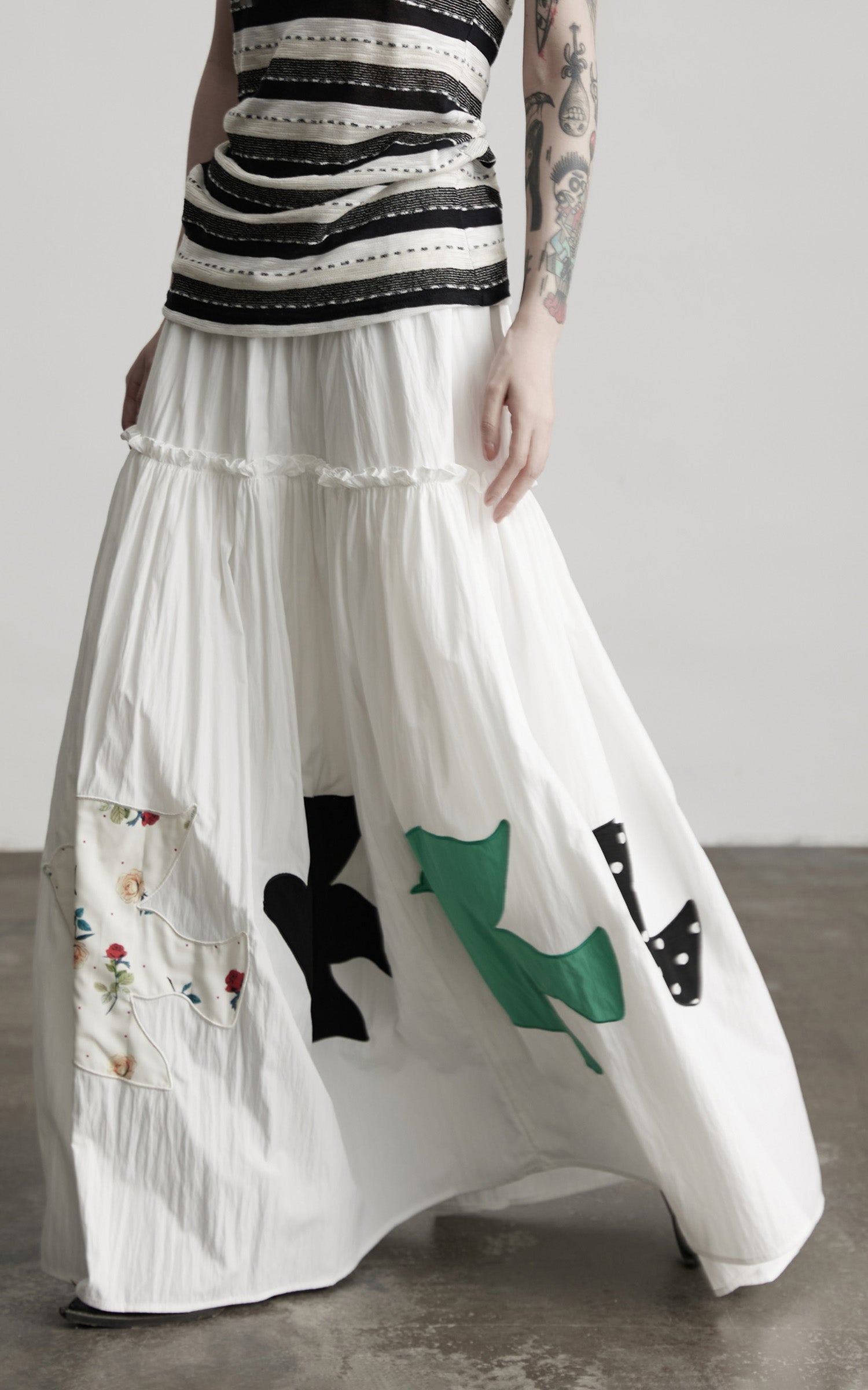 INDULGE Bird Patch Panel Maxi Skirt with Raw Volume Silhouette