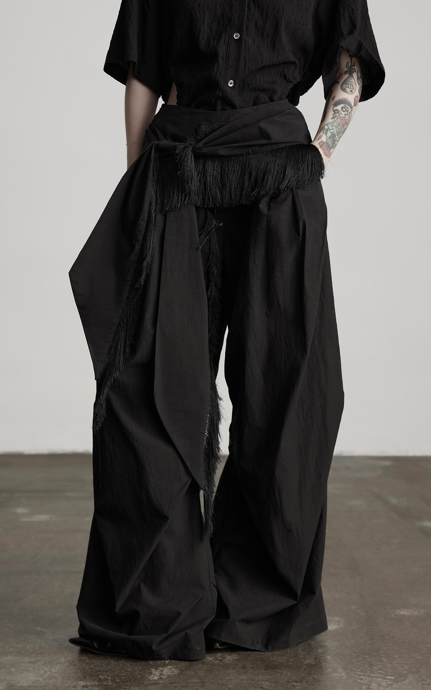 INDULGE Wide-Leg Draped Pants with Fringed Panels and Deconstructed Details