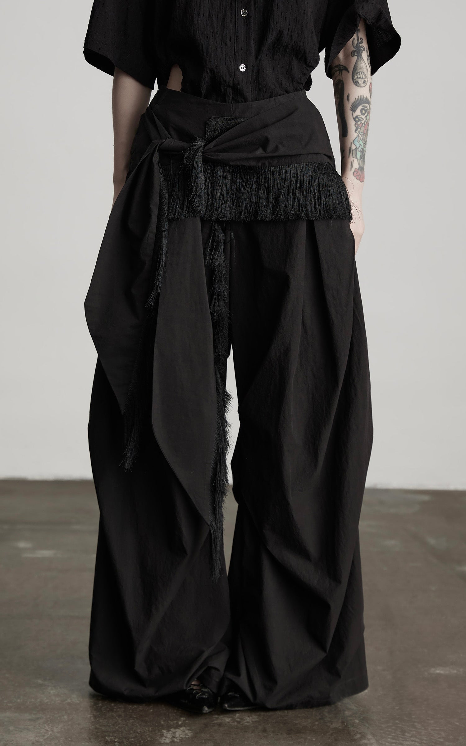 INDULGE Wide-Leg Draped Pants with Fringed Panels and Deconstructed Details
