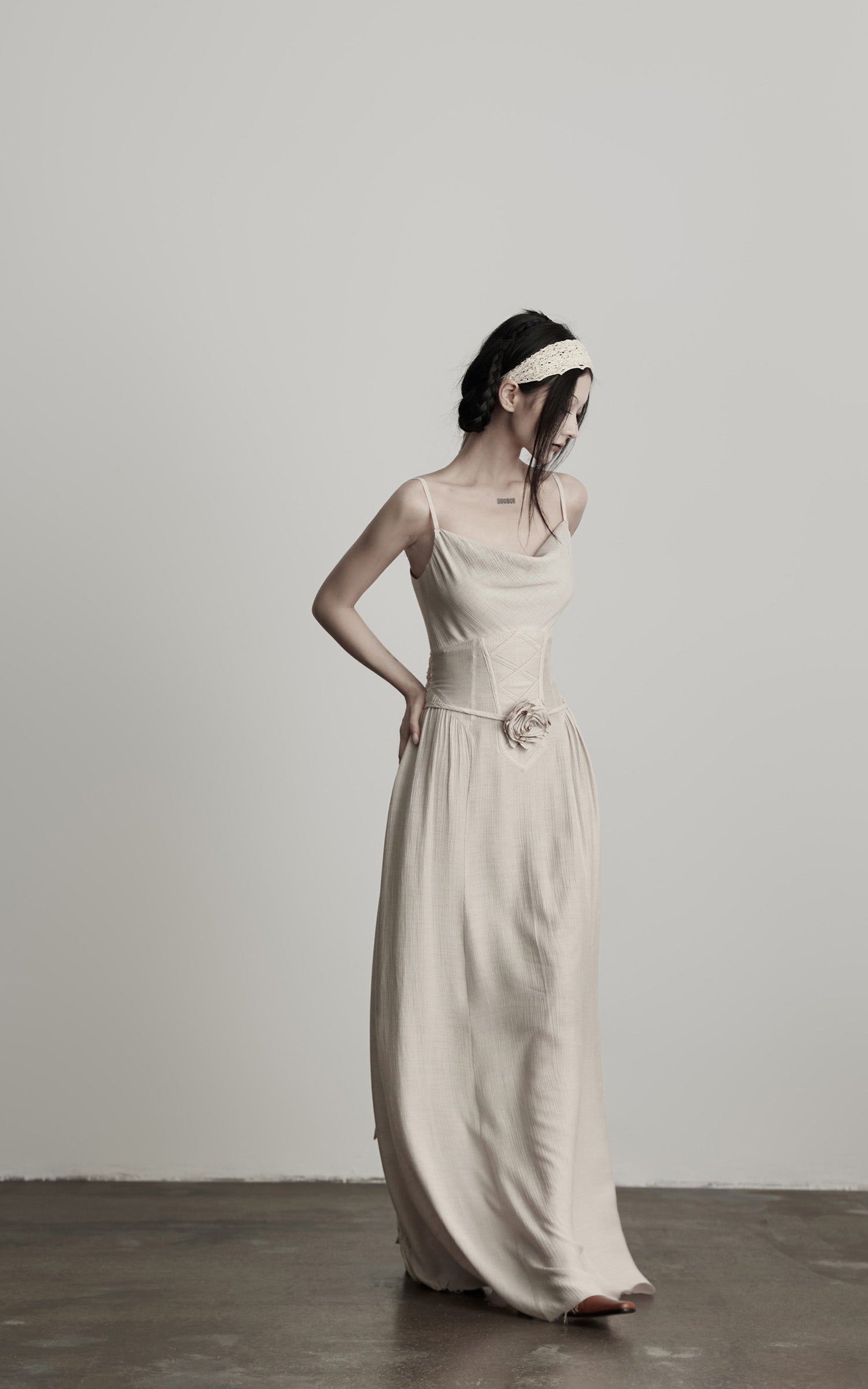 INDULGE Draped Maxi Dress with Corset Waist and Rosette Detail