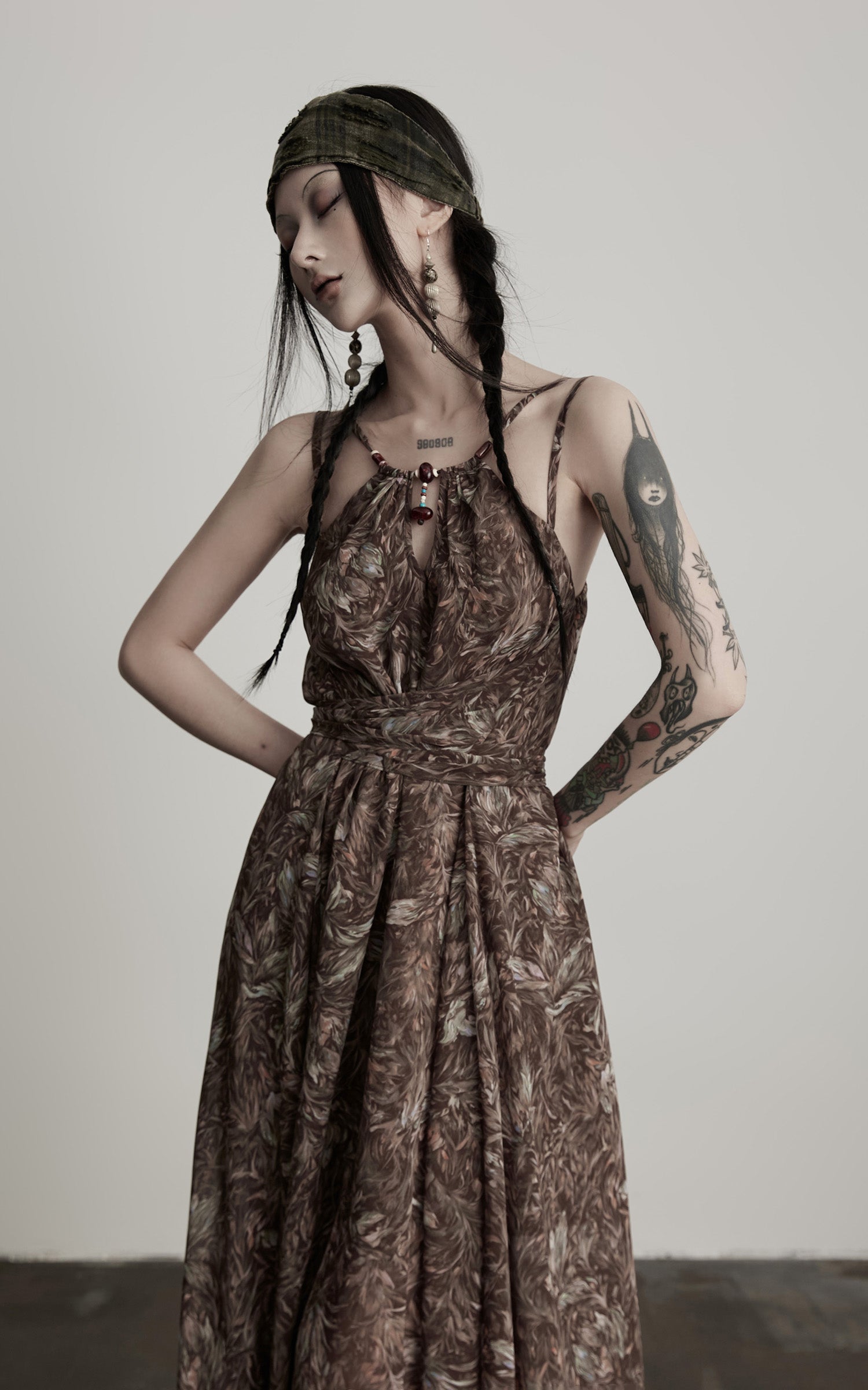 INDULGE Feather-Printed Halter Dress with Beaded Straps and Draped Silhouette