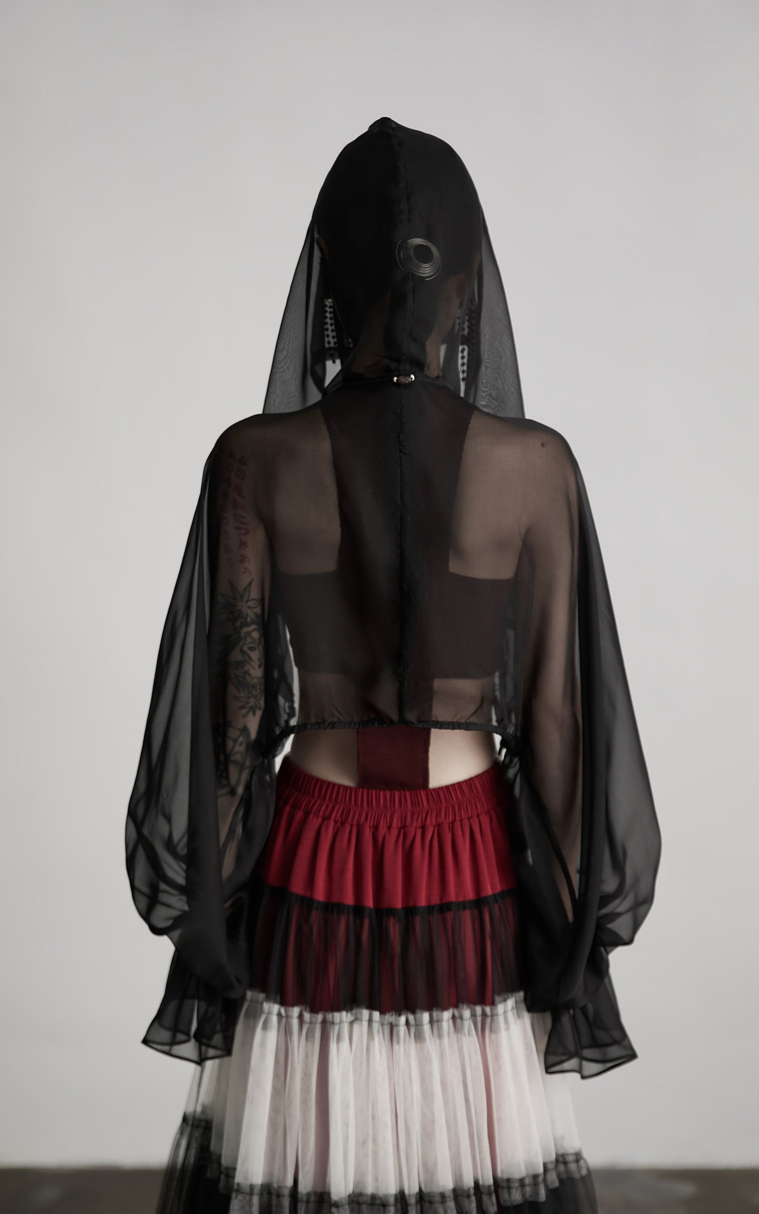 INDULGE Draped Mesh Hooded Cardigan with Tassel Accents and Voluminous Sleeves