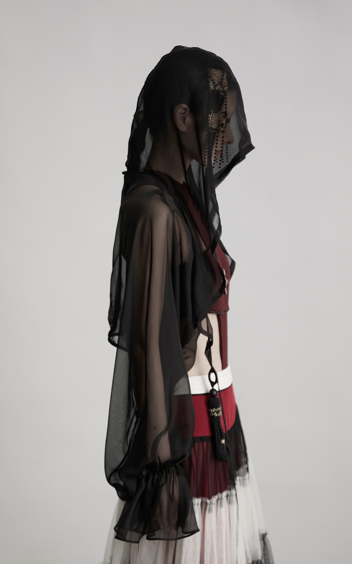 INDULGE Draped Mesh Hooded Cardigan with Tassel Accents and Voluminous Sleeves
