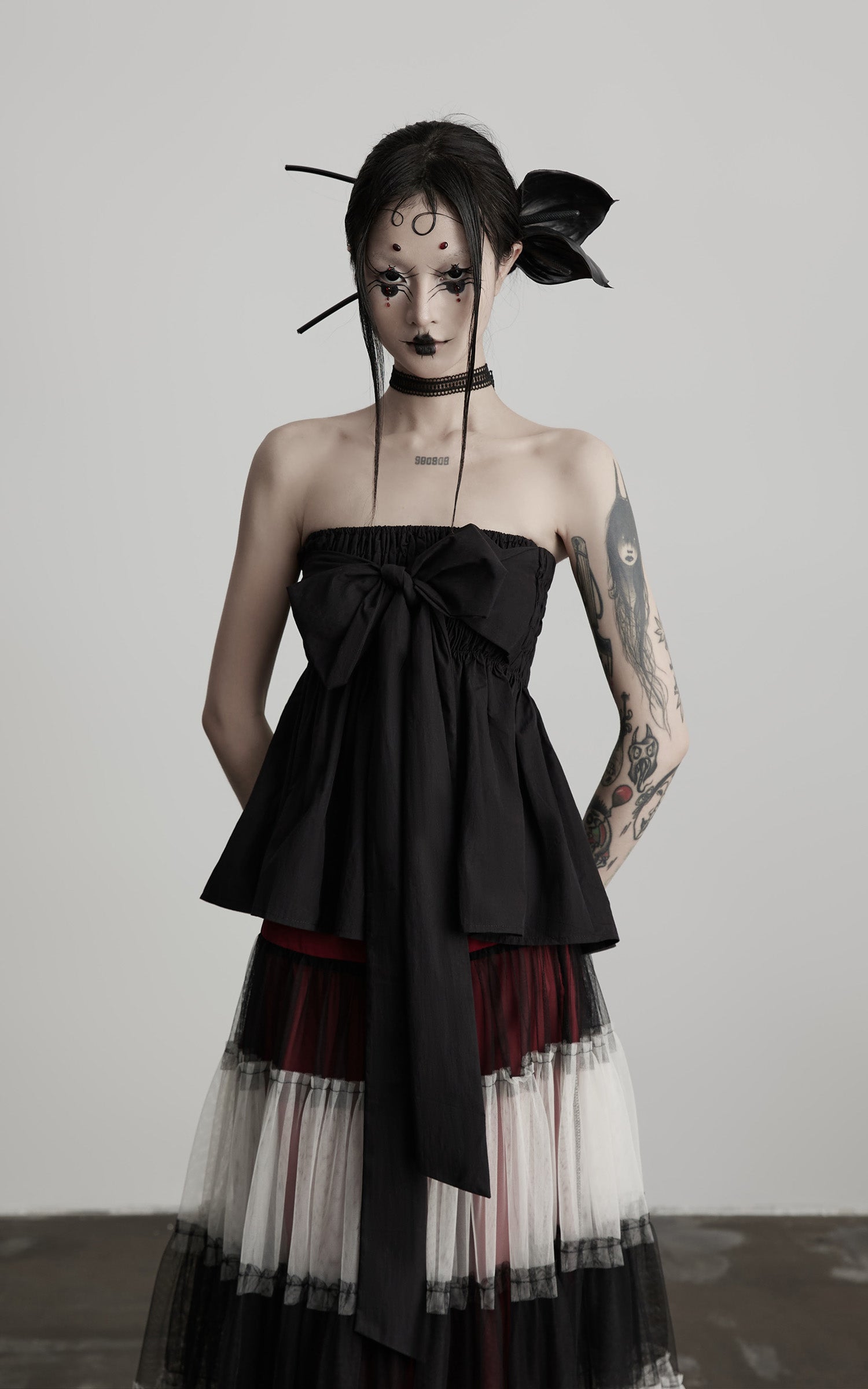 INDULGE Strapless Bow Top with Gathered Bodice and Dramatic Drape