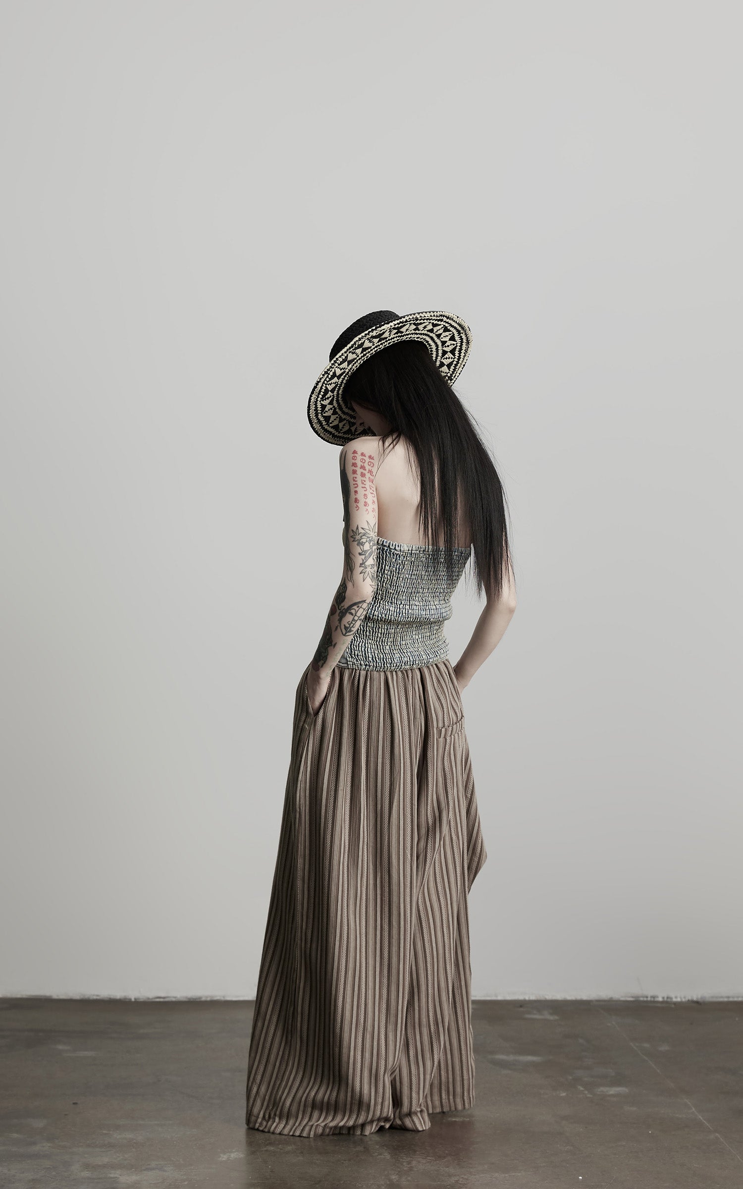 INDULGE Draped Asymmetric Wide-Leg Trousers in Textured Stripe