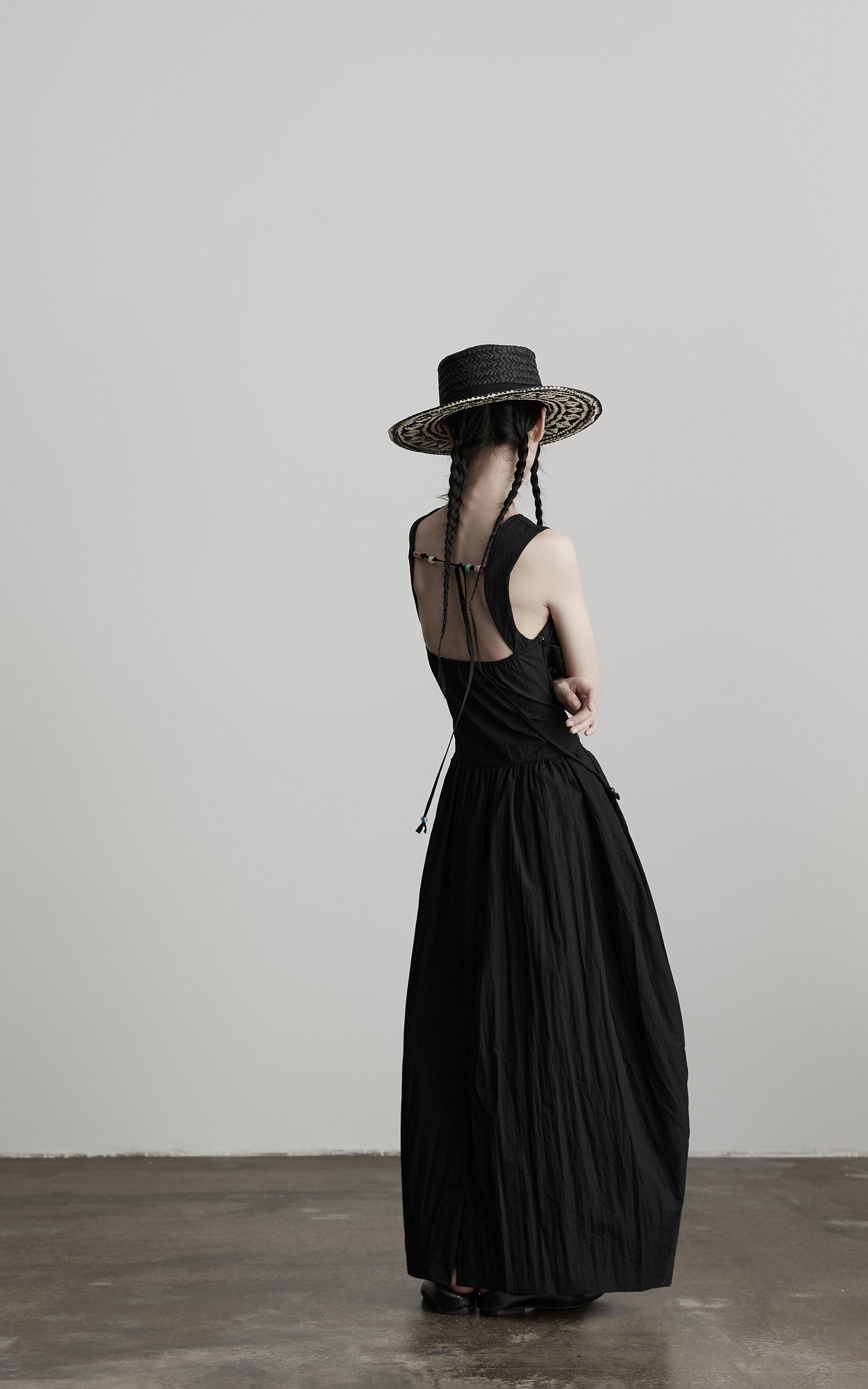INDULGE Sleeveless Draped Maxi Dress with Hand-Tied Bead Embellishment and Sculpted Waist