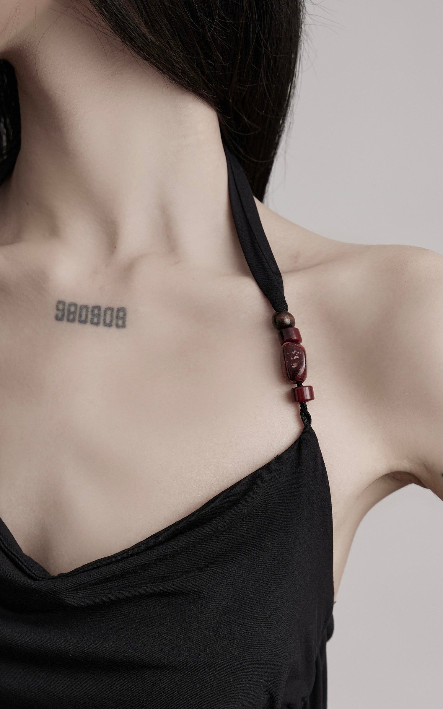 INDULGE Draped Halter Tank with Bead Detail and Asymmetric Ruched Cut-Out