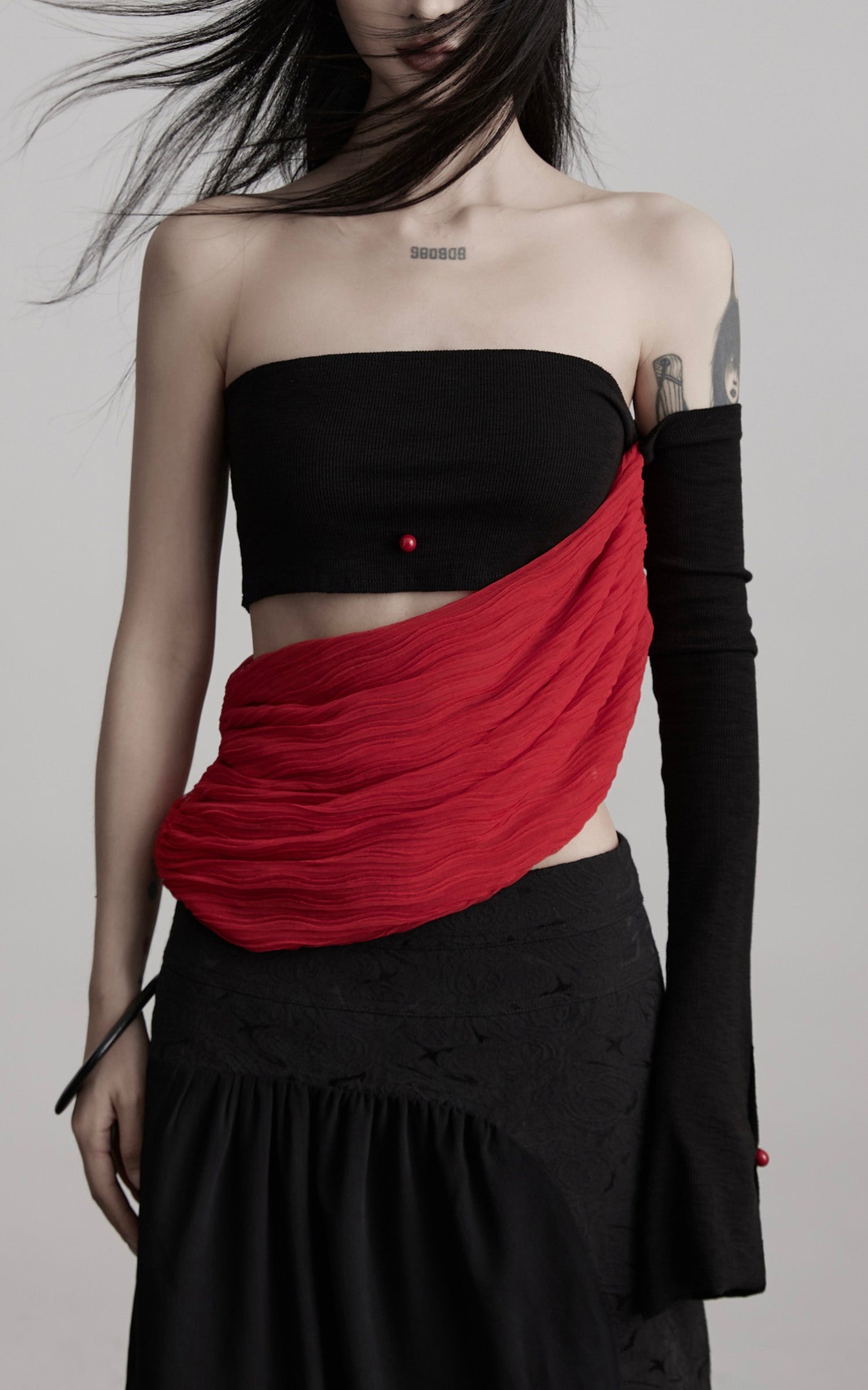 INDULGE Asymmetric Drape Top — Sculptural Red Pleats with Black Knit Base