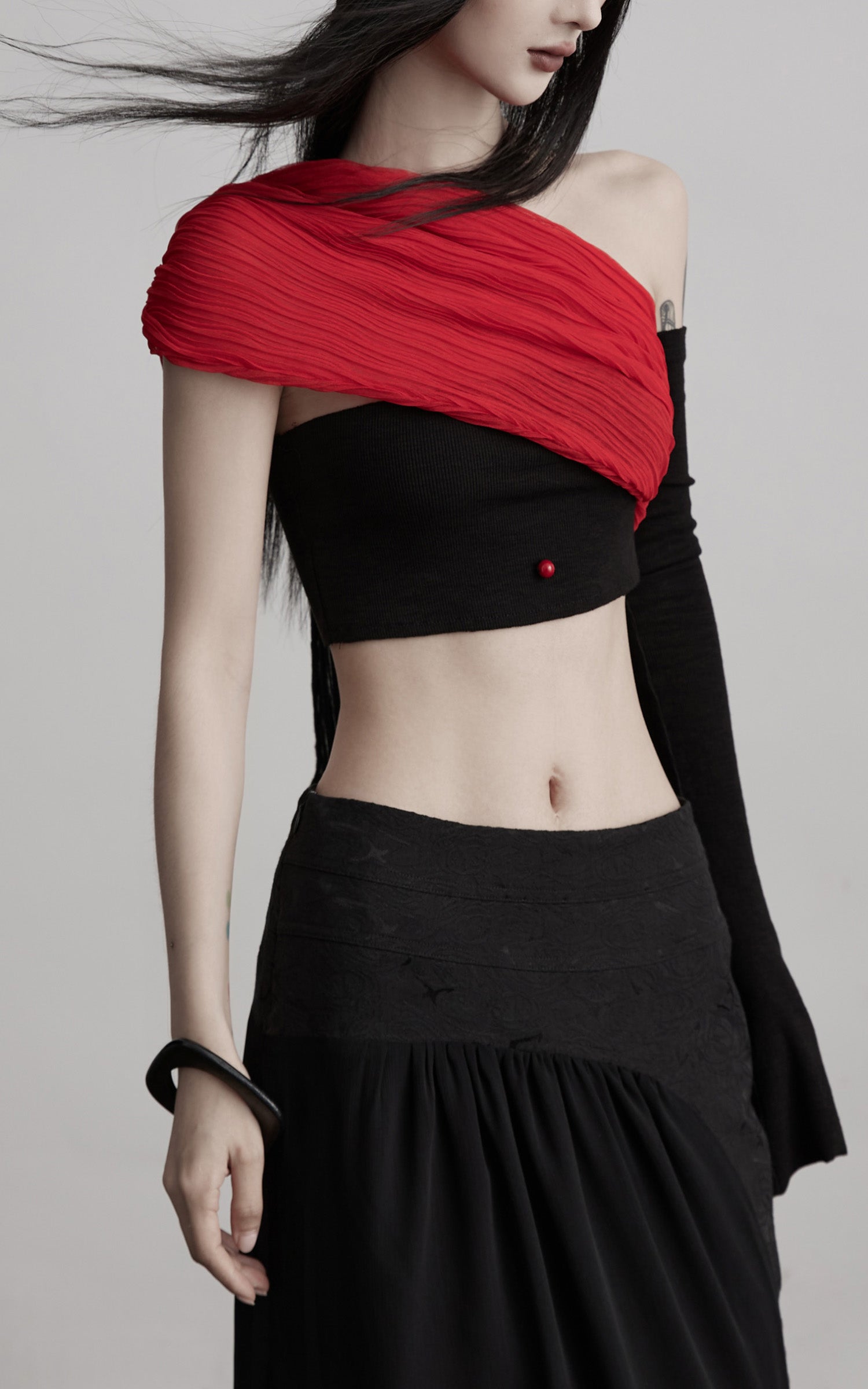 INDULGE Asymmetric Drape Top — Sculptural Red Pleats with Black Knit Base