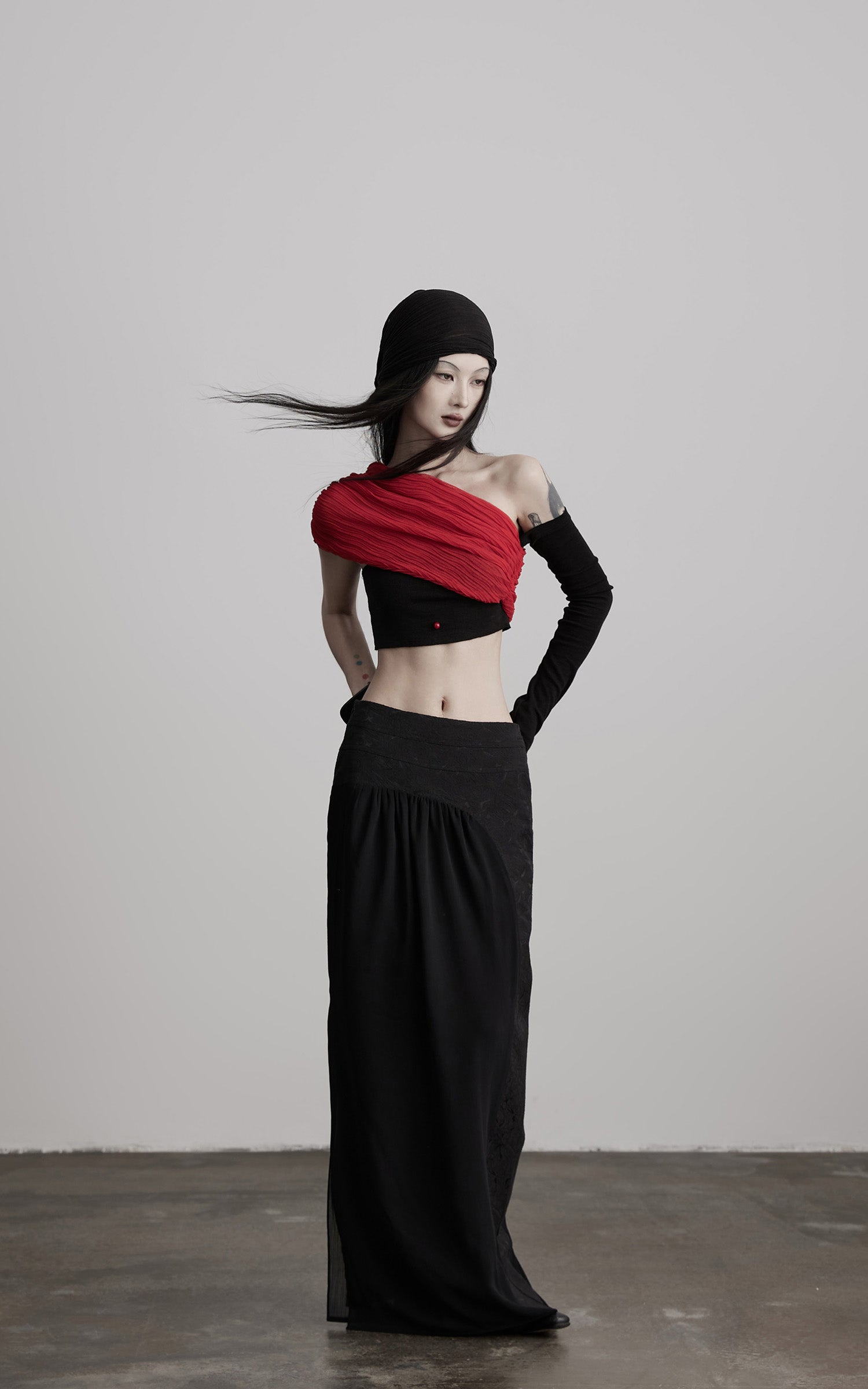 INDULGE Asymmetric Drape Top — Sculptural Red Pleats with Black Knit Base