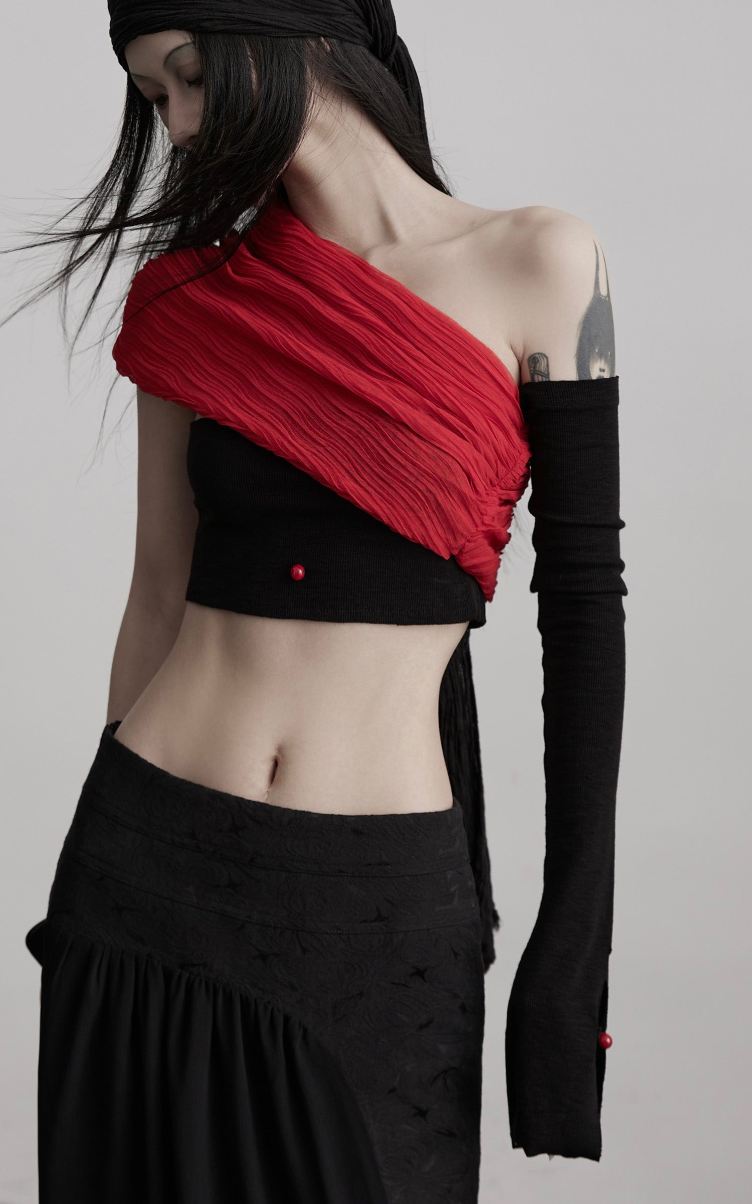 INDULGE Asymmetric Drape Top — Sculptural Red Pleats with Black Knit Base