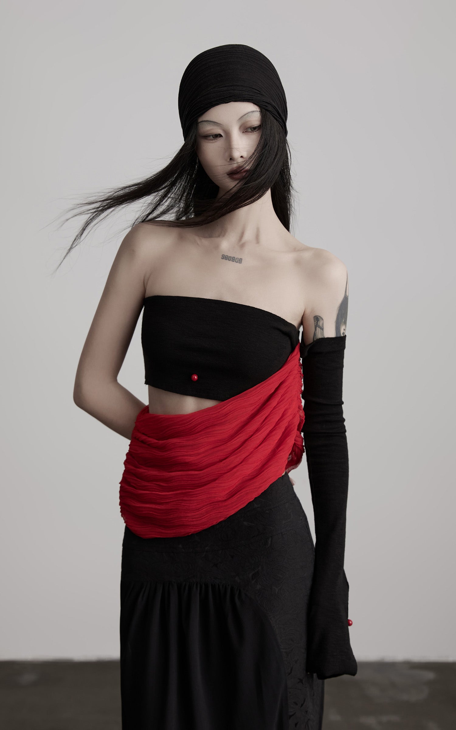 INDULGE Asymmetric Drape Top — Sculptural Red Pleats with Black Knit Base