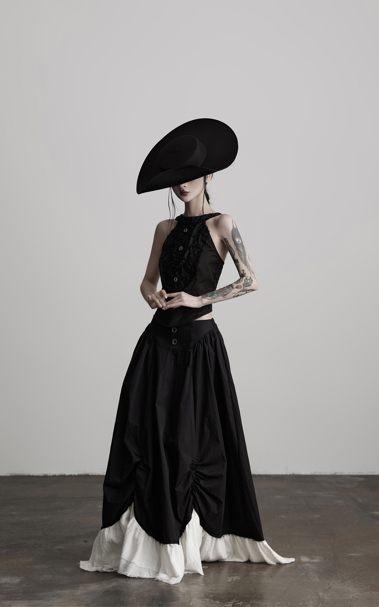 INDULGE Layered Contrast Hem Skirt with Gathered Draping and Buttoned High Waist