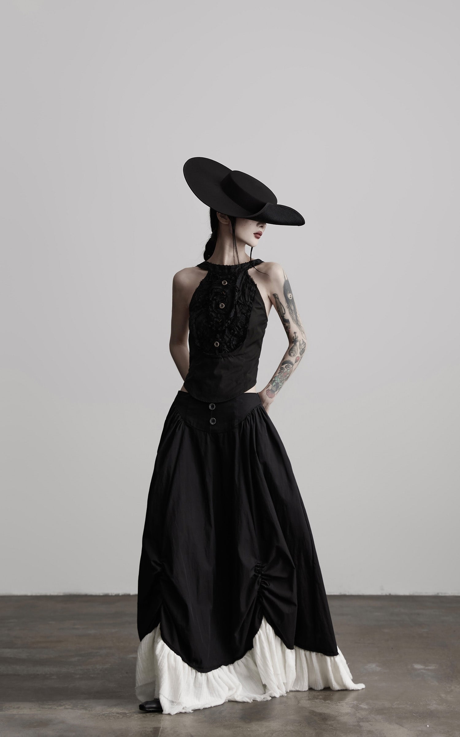 INDULGE Layered Contrast Hem Skirt with Gathered Draping and Buttoned High Waist
