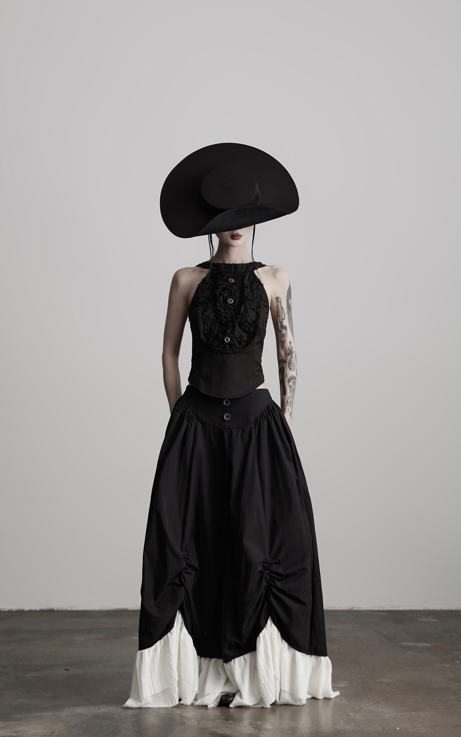 INDULGE Layered Contrast Hem Skirt with Gathered Draping and Buttoned High Waist