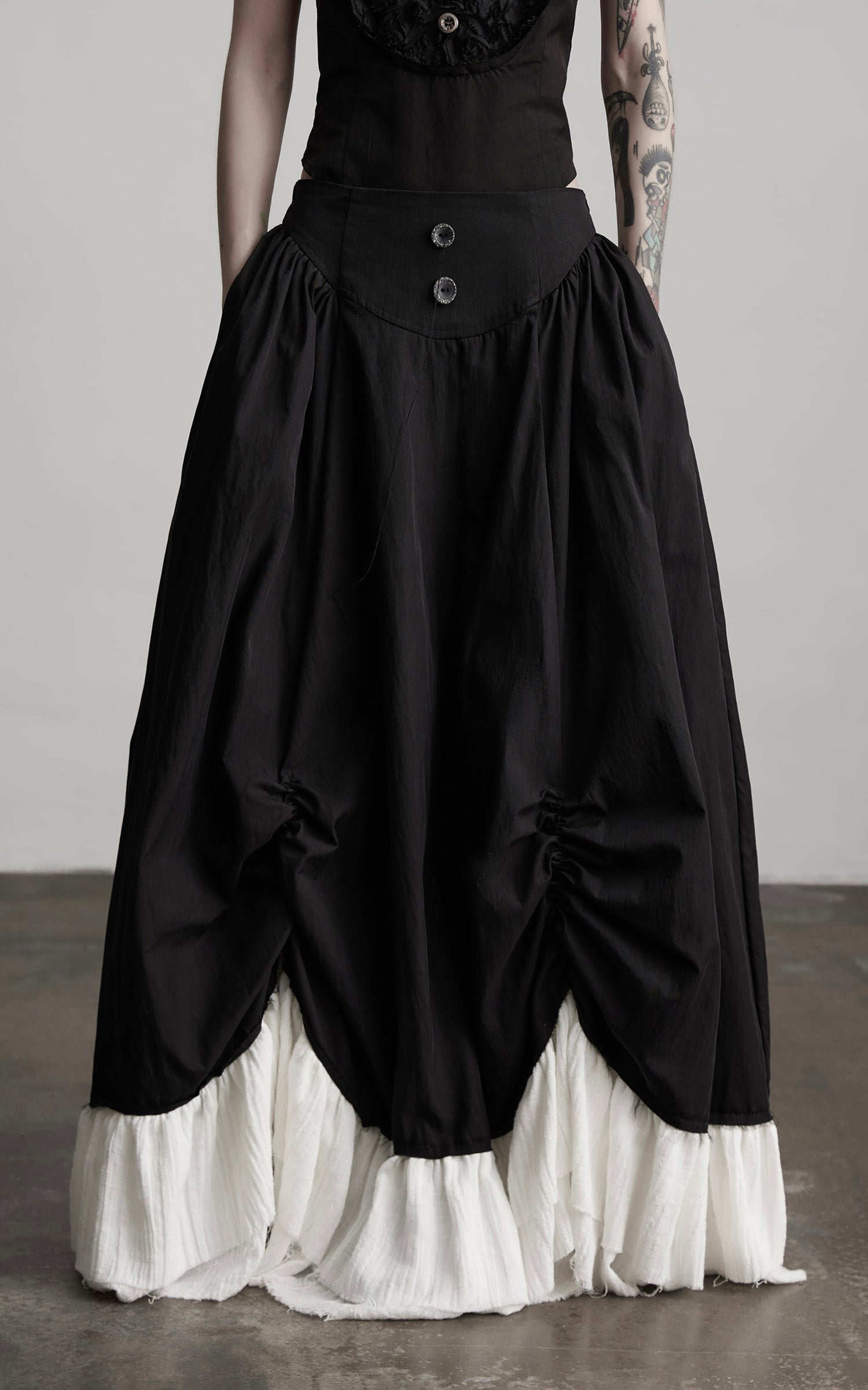 INDULGE Layered Contrast Hem Skirt with Gathered Draping and Buttoned High Waist