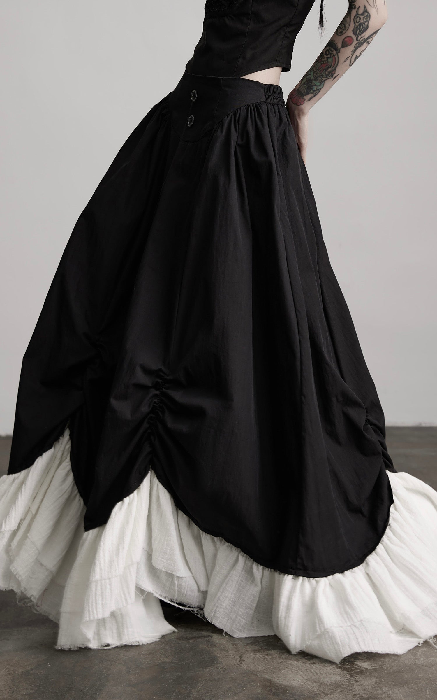 INDULGE Layered Contrast Hem Skirt with Gathered Draping and Buttoned High Waist