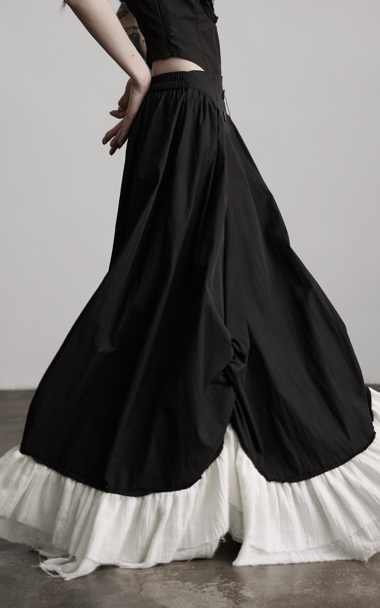 INDULGE Layered Contrast Hem Skirt with Gathered Draping and Buttoned High Waist
