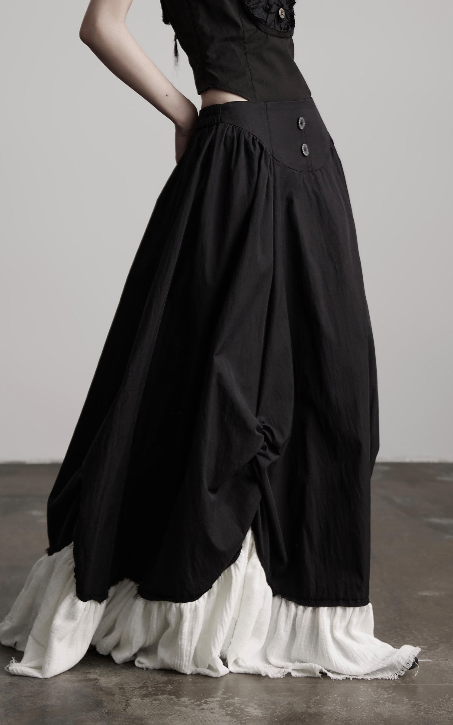 INDULGE Layered Contrast Hem Skirt with Gathered Draping and Buttoned High Waist