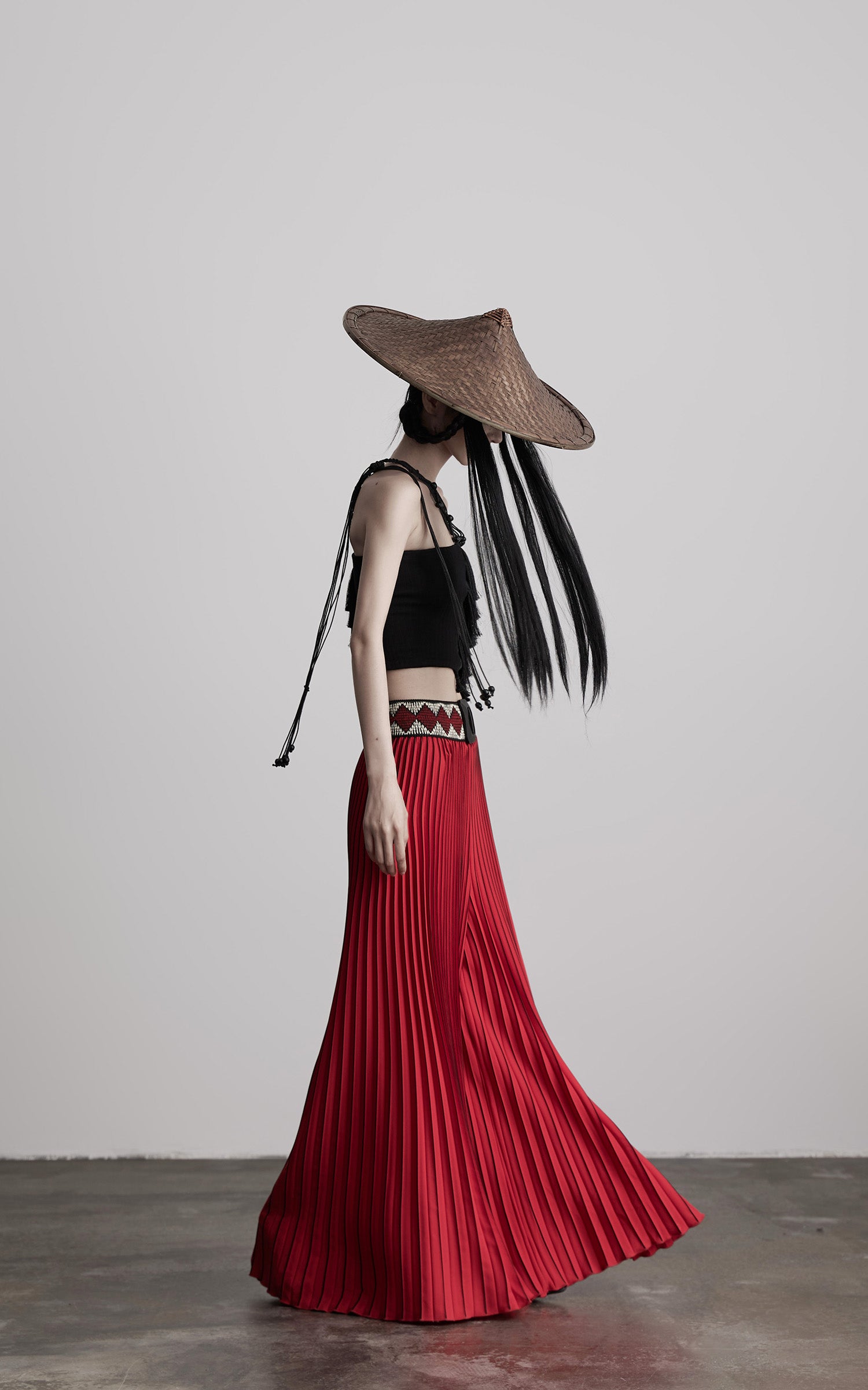 INDULGE Red Pleated Wide-Leg Skirt with Geometric Woven Waistband and Statement Buckle