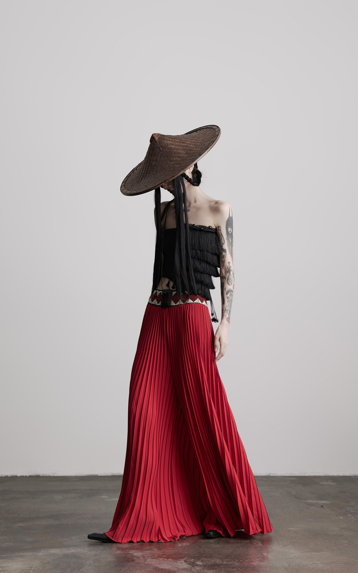INDULGE Red Pleated Wide-Leg Skirt with Geometric Woven Waistband and Statement Buckle