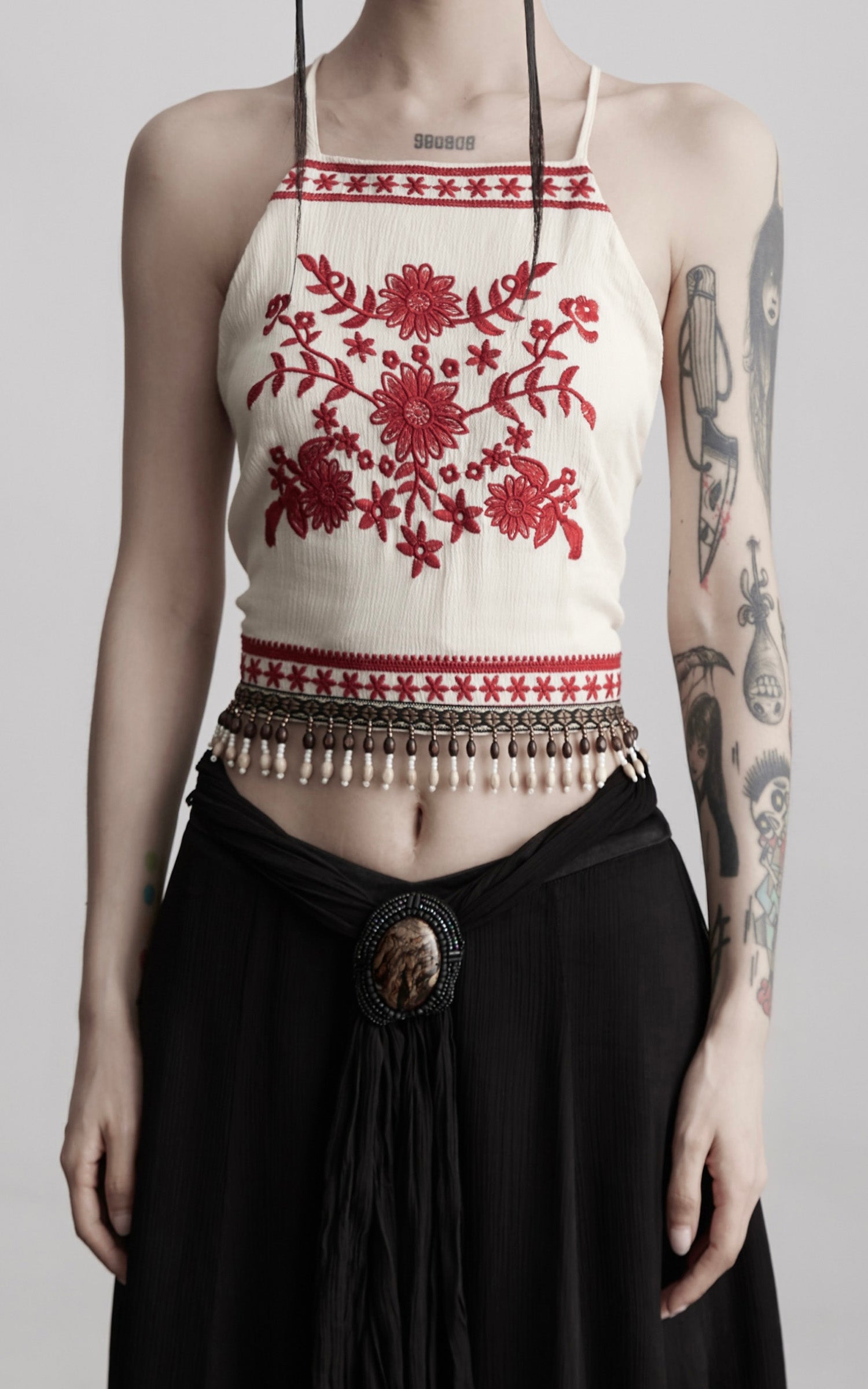 INDULGE Embroidered Halter Top with Floral Motif and Beaded Hem Detailing