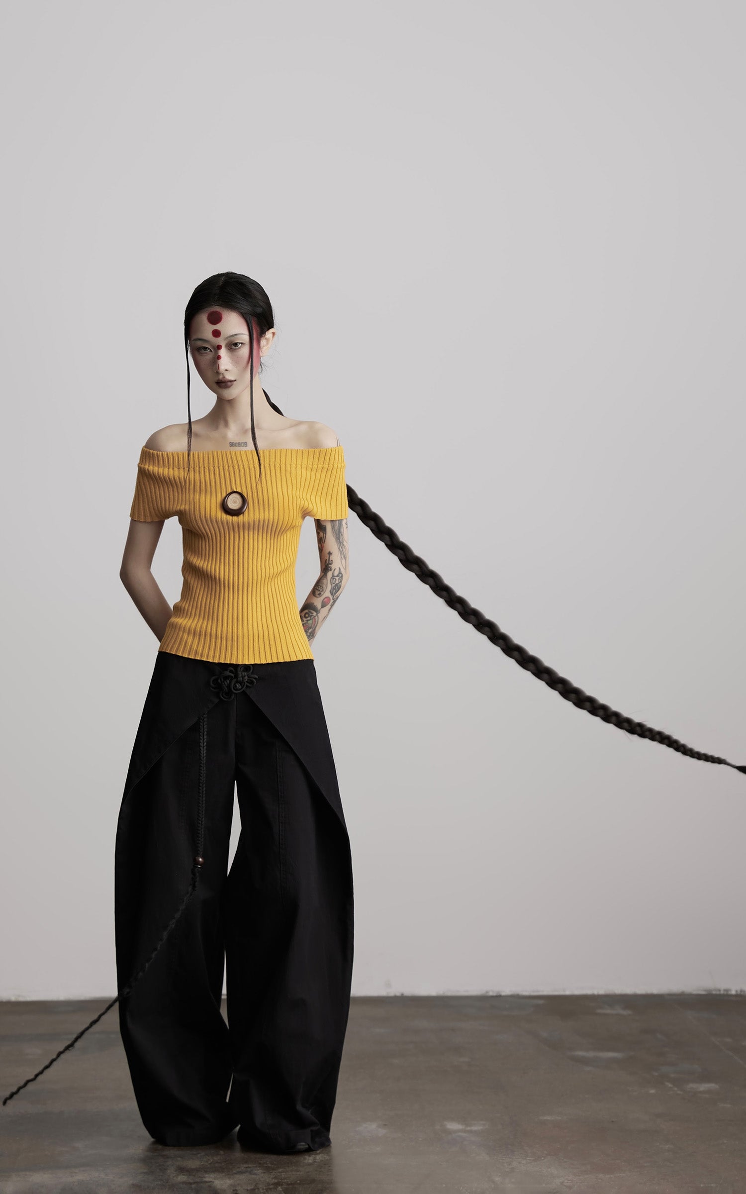 INDULGE Off-Shoulder Ribbed Knit Top with Wooden Medallion Detail