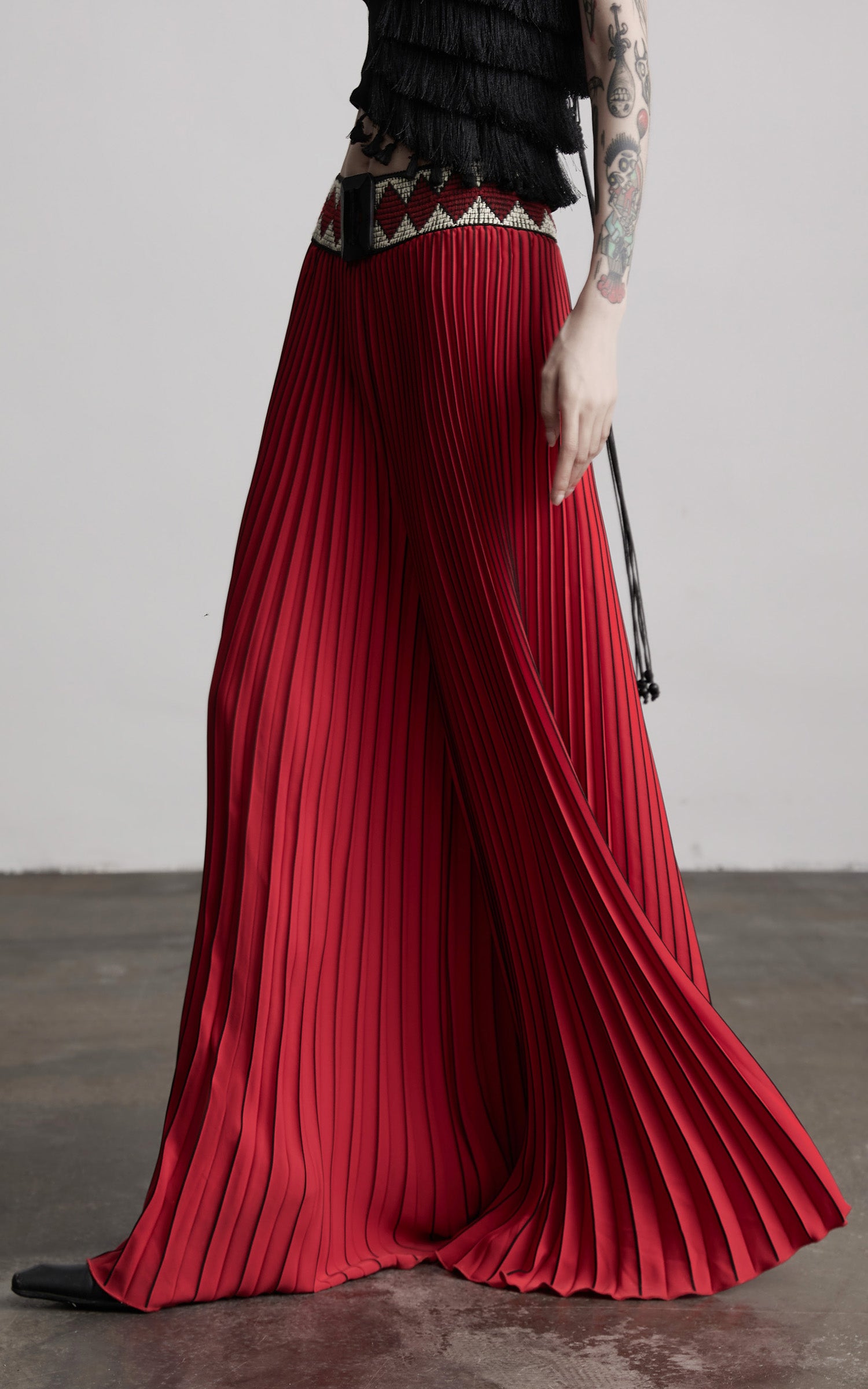 INDULGE Red Pleated Wide-Leg Skirt with Geometric Woven Waistband and Statement Buckle