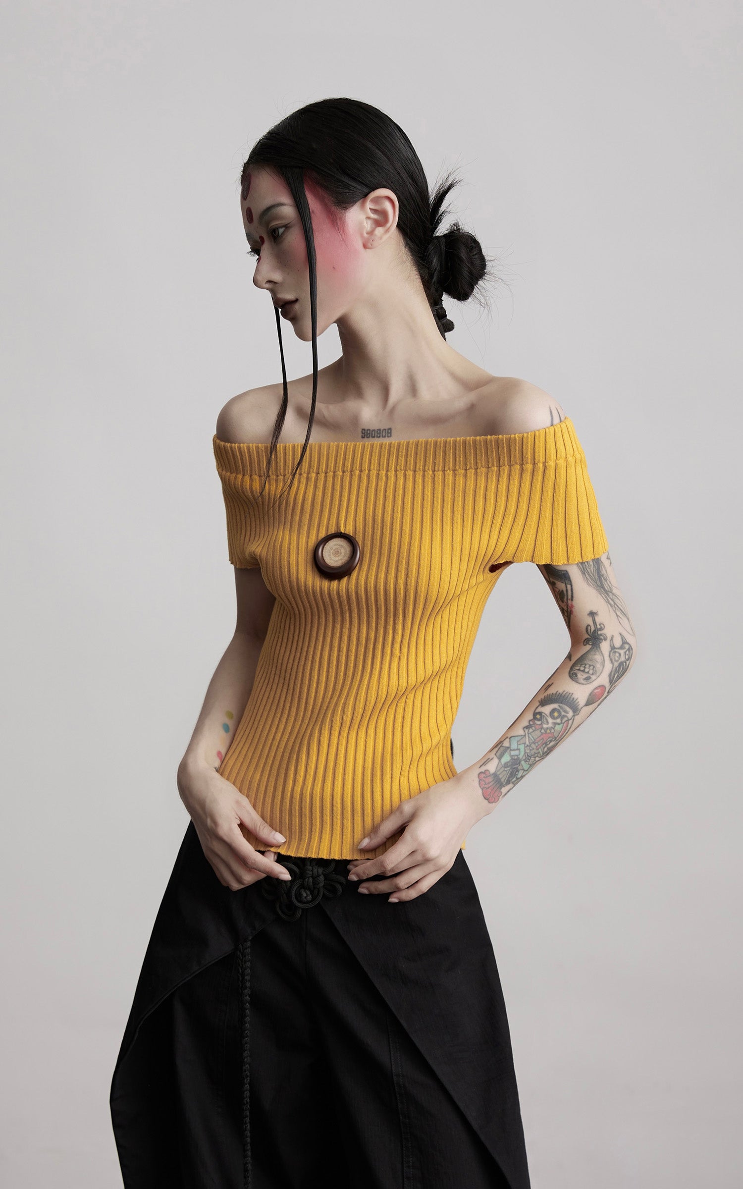 INDULGE Off-Shoulder Ribbed Knit Top with Wooden Medallion Detail