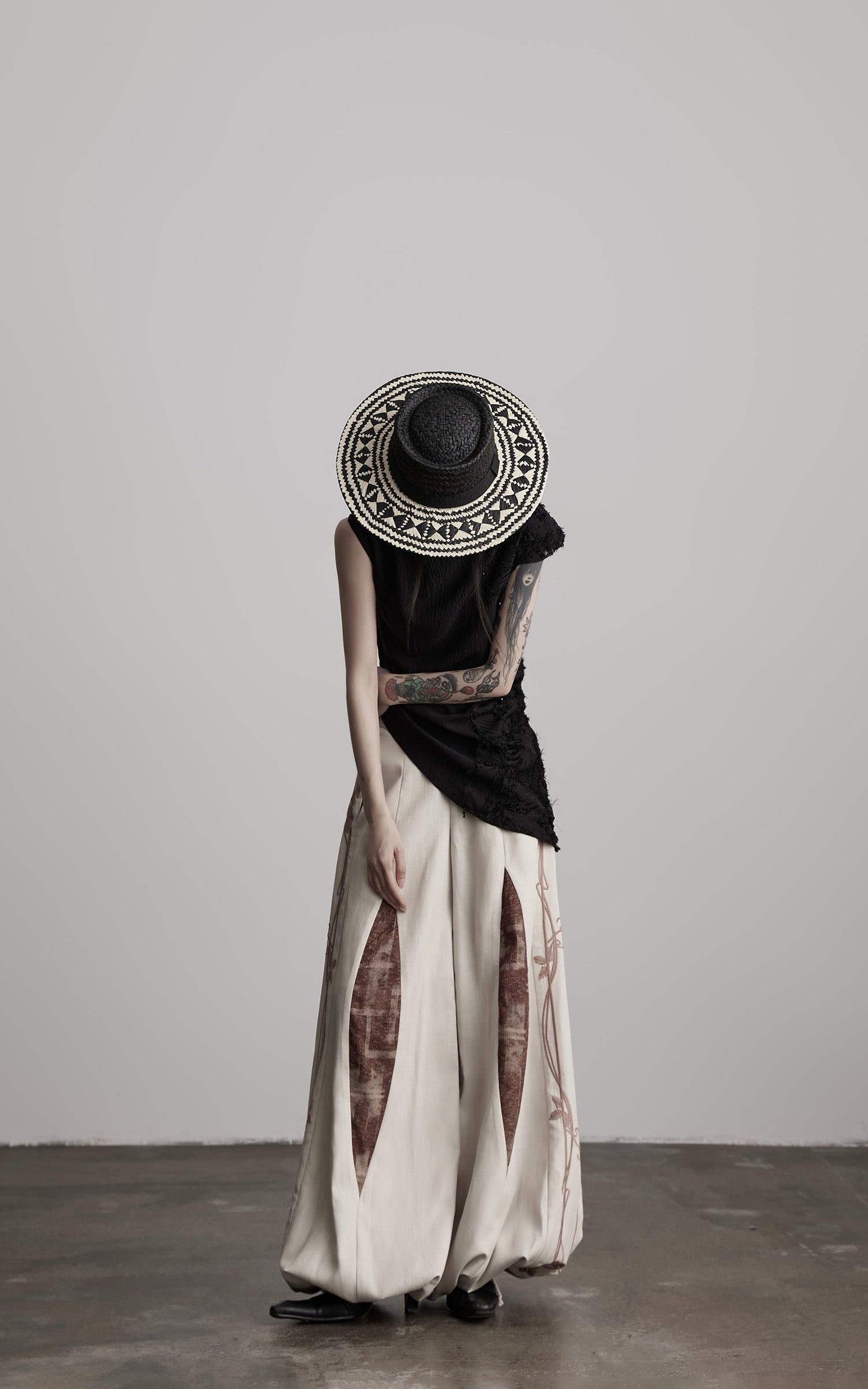 INDULGE Asymmetric Textured Sleeveless Top with Frayed and Beaded Detailing