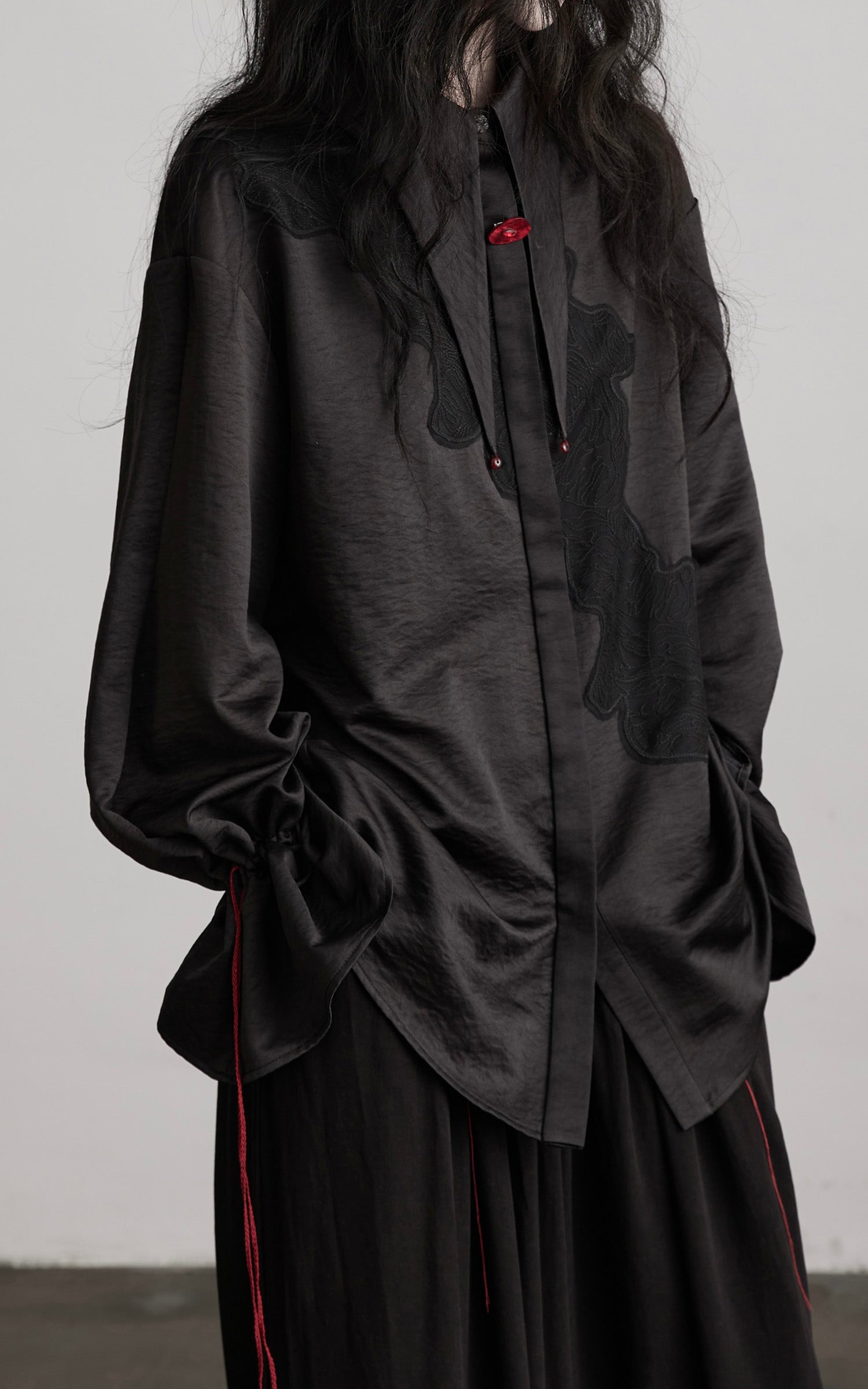 INDULGE Asymmetric Textured Shirt with Drawstring Sleeves and Red Accents