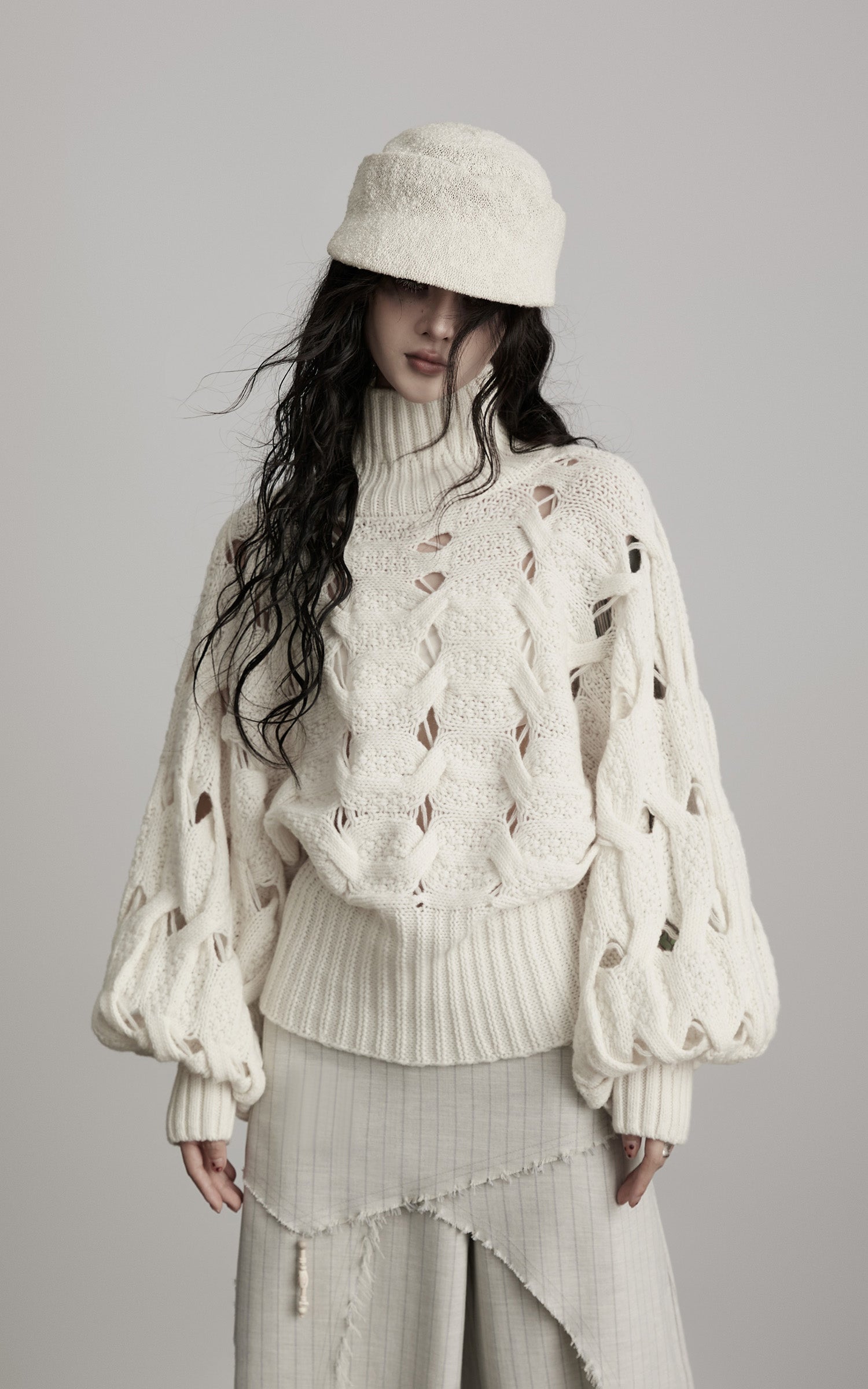 INDULGE Braided Void Turtleneck Sweater