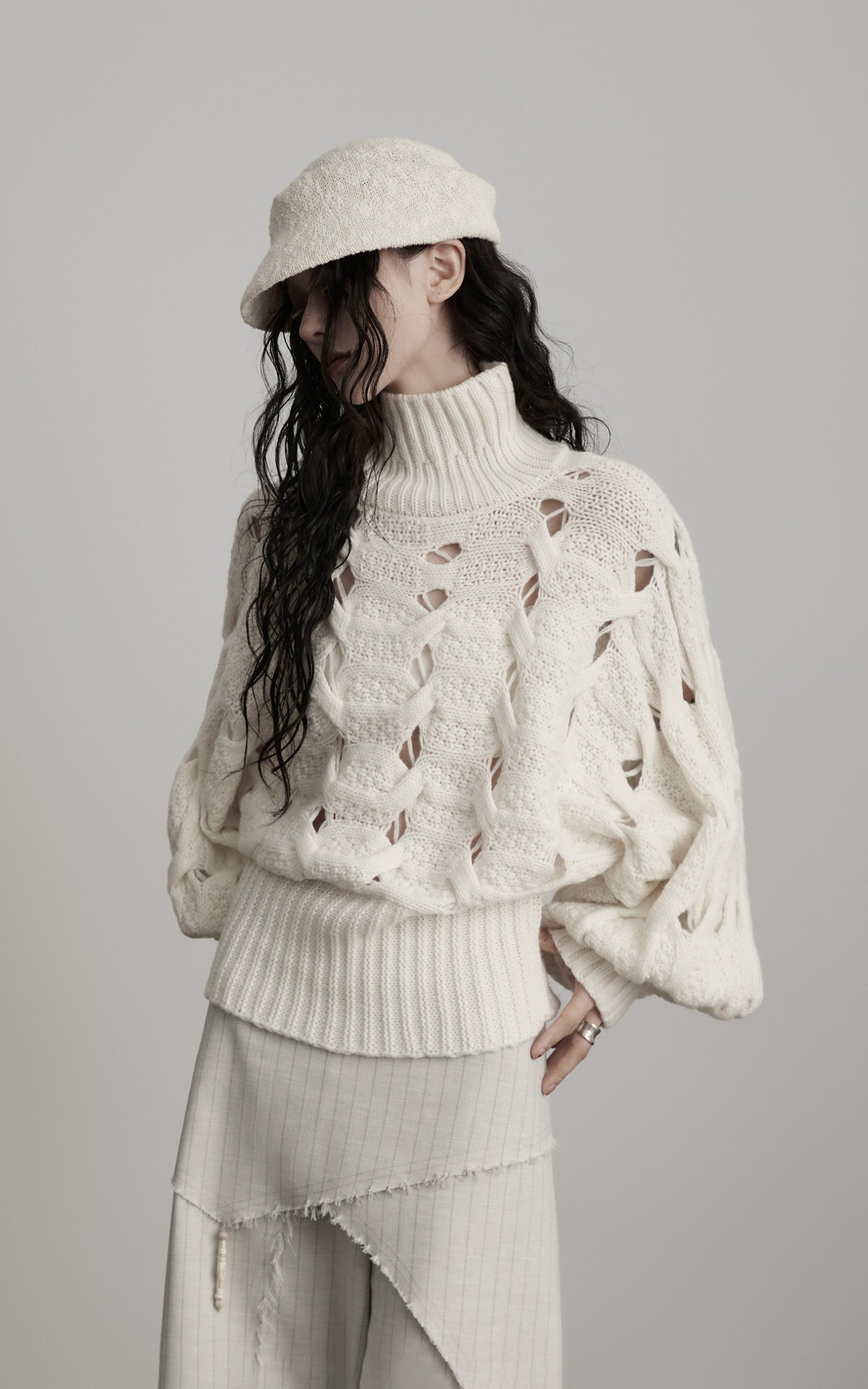 <tc>INDULGE</tc> Pull à col roulé tressé Void