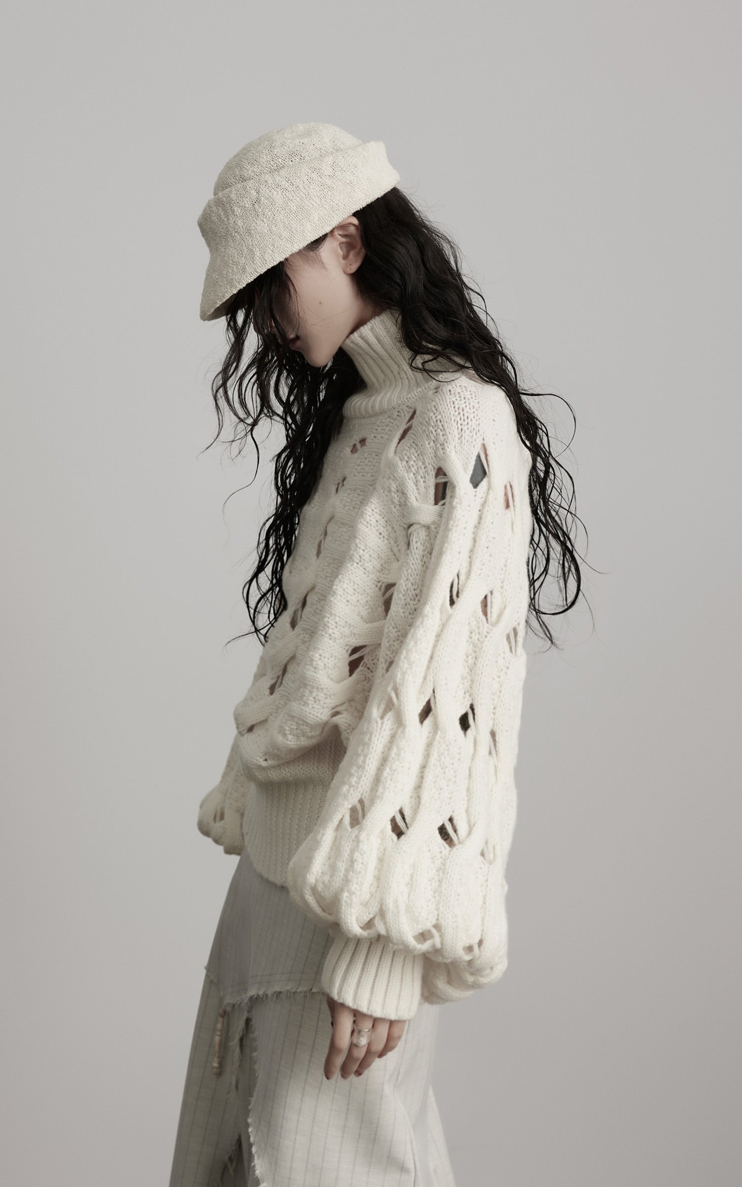 <tc>INDULGE</tc> Pull à col roulé tressé Void