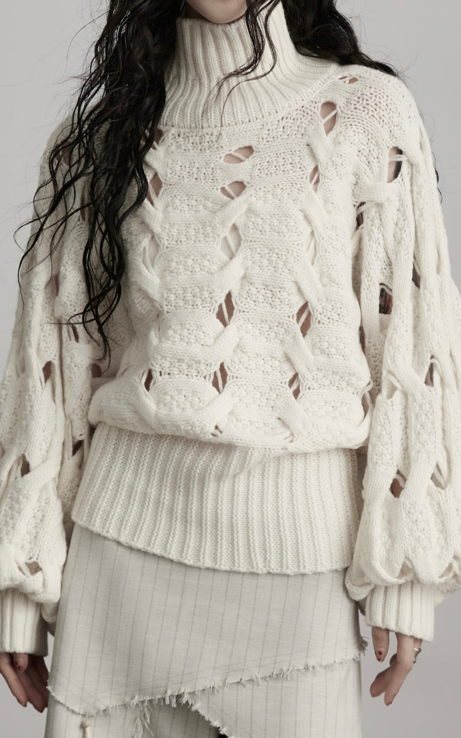 <tc>INDULGE</tc> Pull à col roulé tressé Void