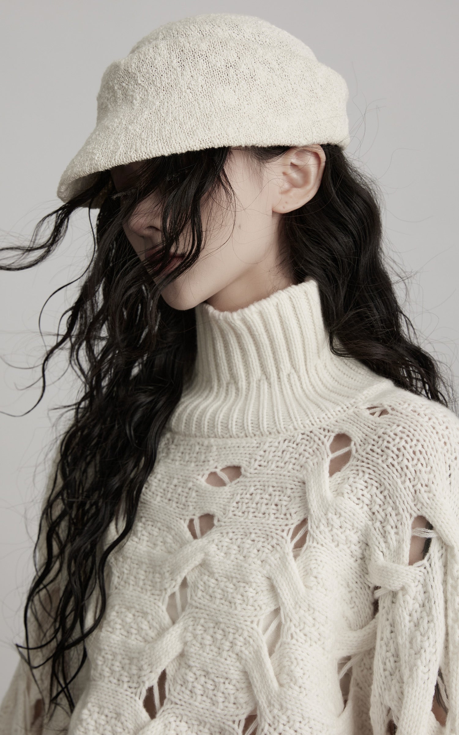 <tc>INDULGE</tc> Pull à col roulé tressé Void