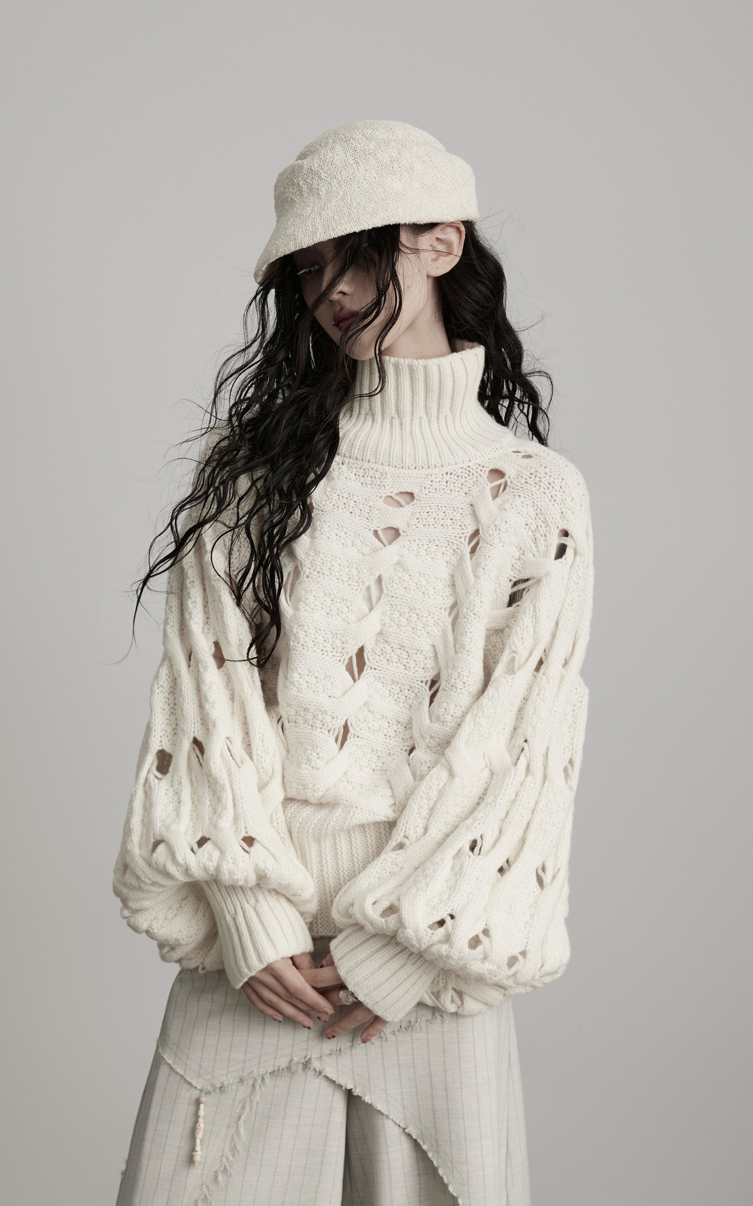 <tc>INDULGE</tc> Pull à col roulé tressé Void