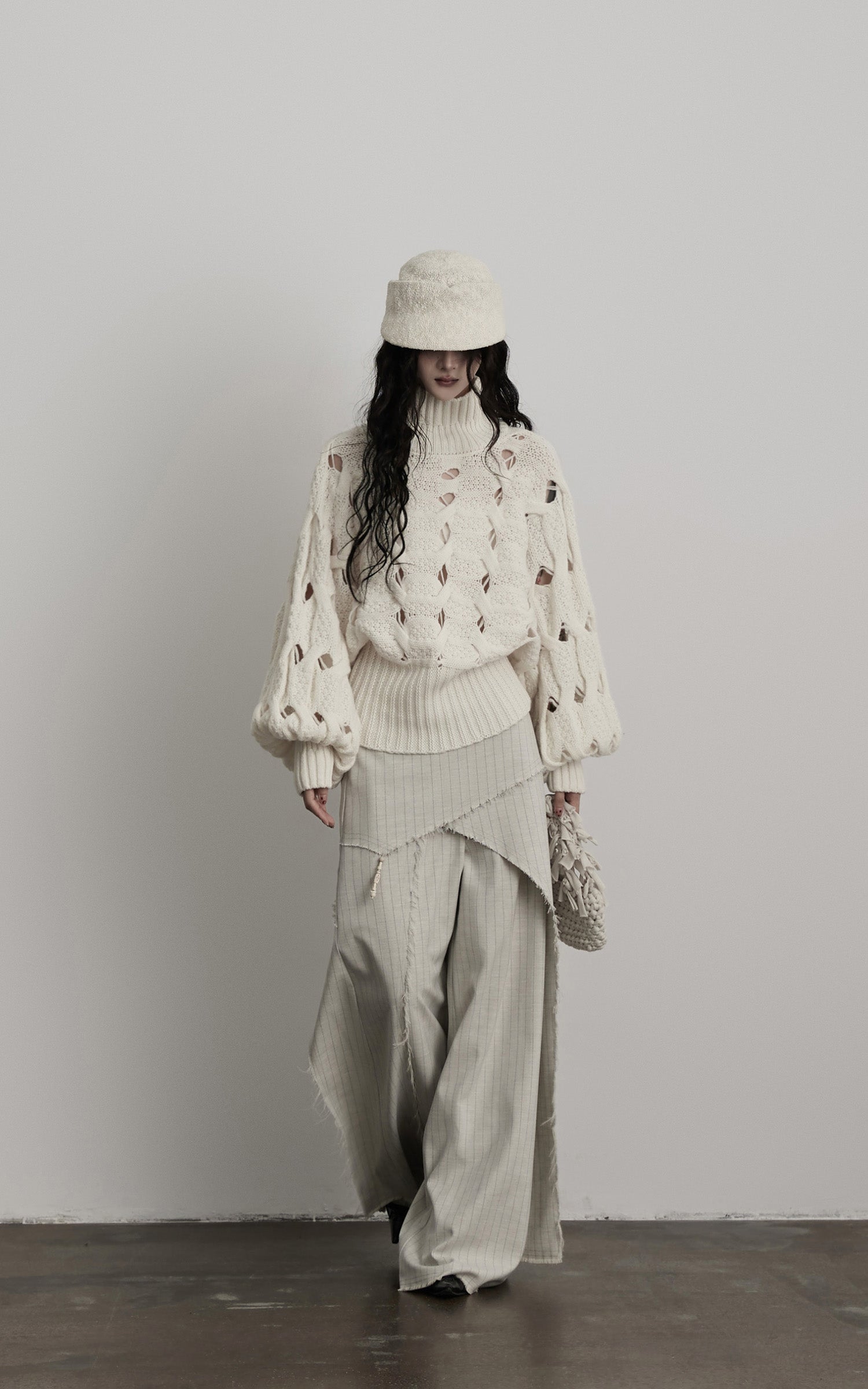 <tc>INDULGE</tc> Pull à col roulé tressé Void